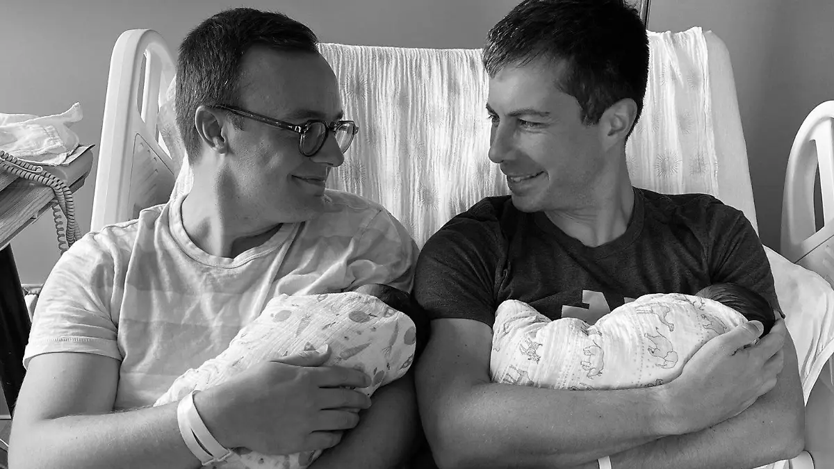 U.S. Transportation Secretary Pete Buttigieg and his husband Chasten introduce their two babies, Penelope Rose and Joseph August, in this social media photo obtained by Reuters September 4, 2021. TWITTER/@PETEBUTTIGIEG via REUTERS ATTENTION EDITORS - THIS IMAGE HAS BEEN SUPPLIED BY A THIRD PARTY. NO RESALES. NO ARCHIVES