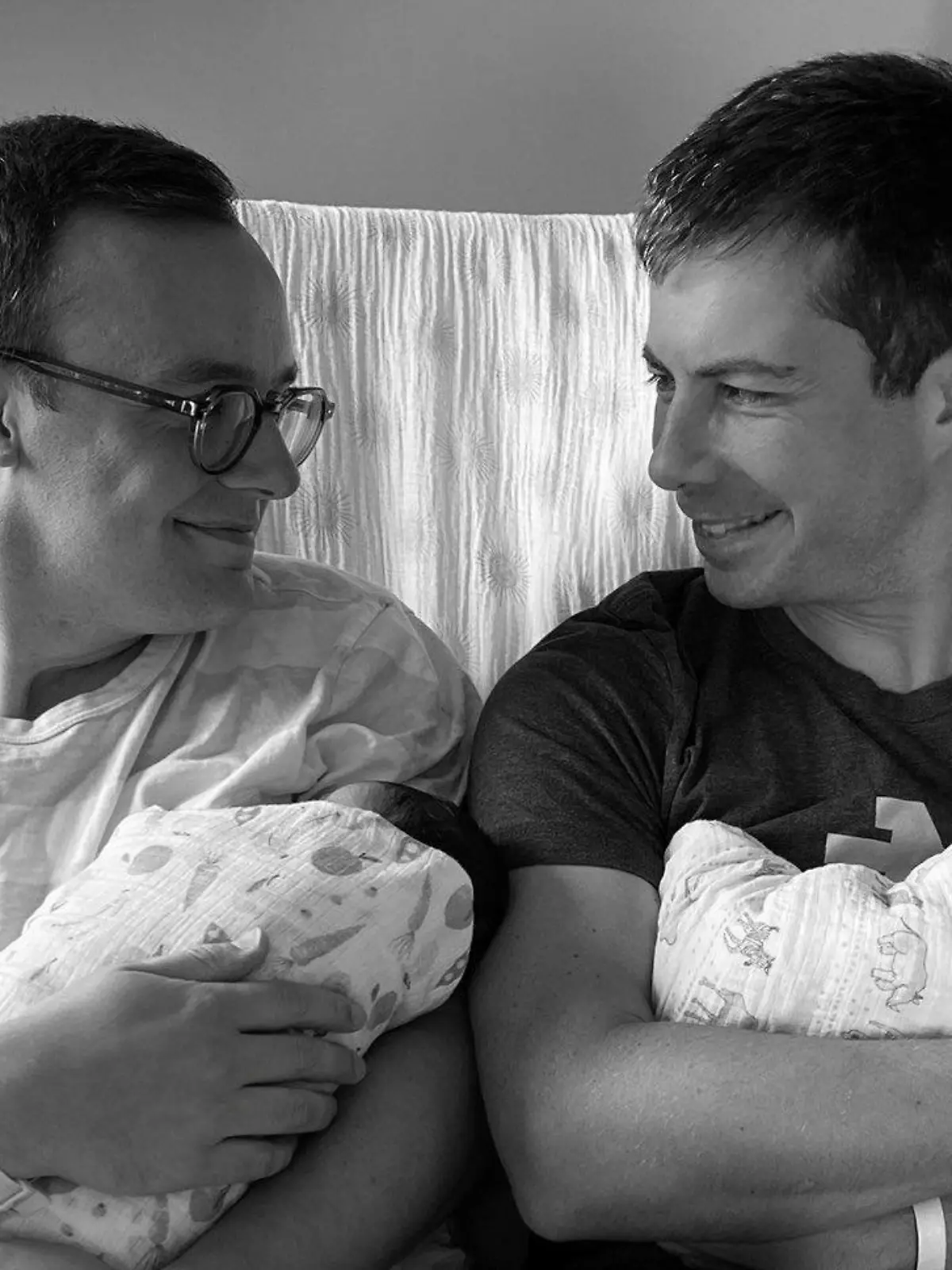 U.S. Transportation Secretary Pete Buttigieg and his husband Chasten introduce their two babies, Penelope Rose and Joseph August, in this social media photo obtained by Reuters September 4, 2021. TWITTER/@PETEBUTTIGIEG via REUTERS  ATTENTION EDITORS - THIS IMAGE HAS BEEN SUPPLIED BY A THIRD PARTY. NO RESALES. NO ARCHIVES