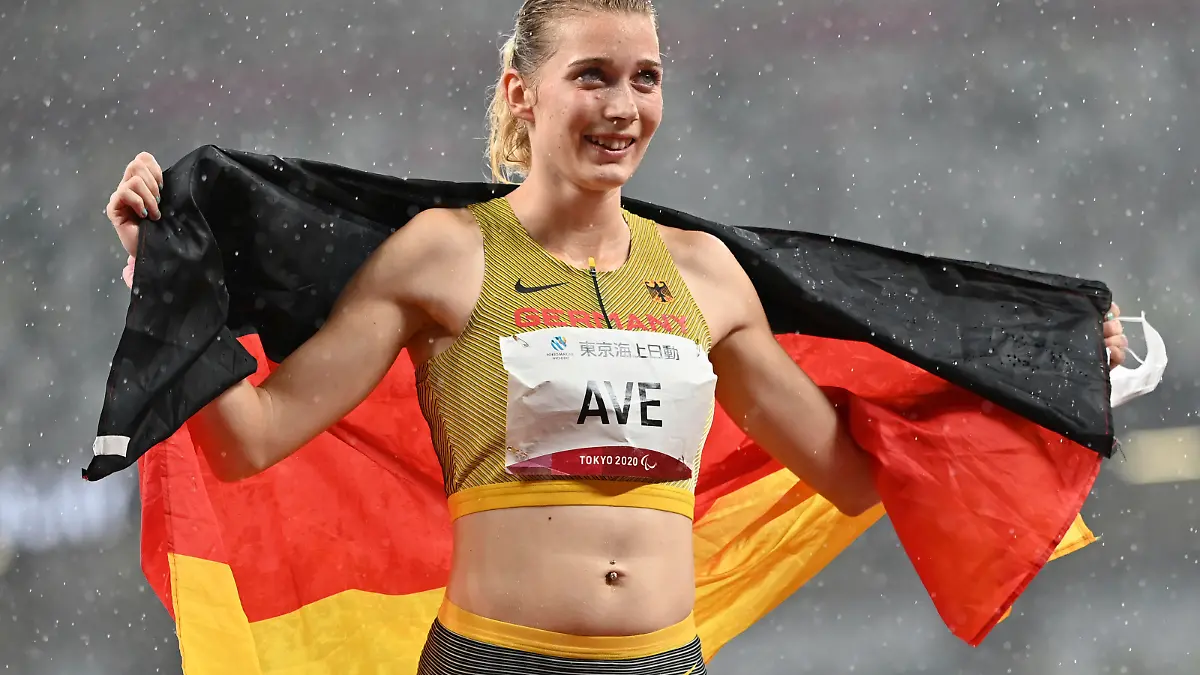 Germany's AVE Lindy poses for a photo after winning the Women's 400m - T38 at the Summer Paralympic Games in Tokyo on Sep. 4, 2021. ( The Yomiuri Shimbun via AP Images )
