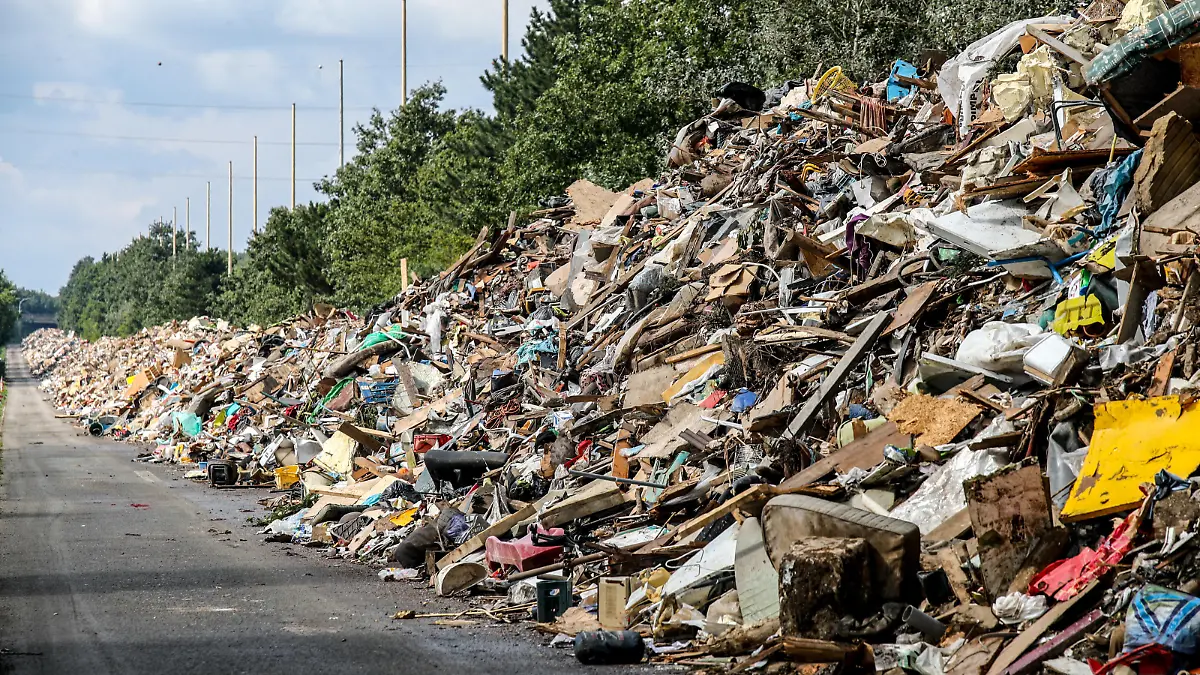 An arm of a disused motorway near Liege collects mountains of waste from the floods of mid-July. Mountains of waste are piling up disproportionately in all the valleys affected by the centenary floods of 14 and 15 July 2021 in the Liege region, Belgium, on August 28, 2021. Photo by Philippe Bourguet/ BePress/ABACAPRESS.COM
