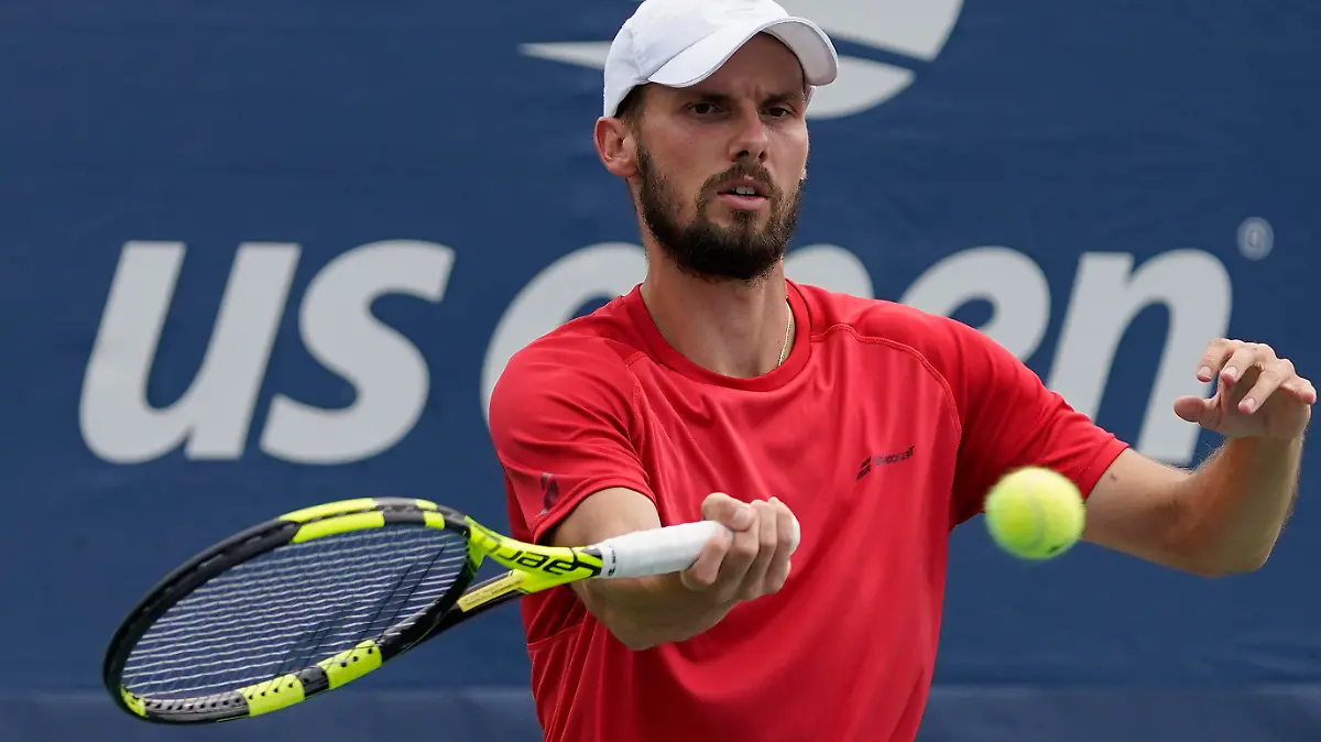 Oscar Otte, of Germany, returns a shot to Lorenzo Sonego, of Italy, during the first round of the US Open tennis championships, Tuesday, Aug. 31, 2021, in New York. (AP Photo/Seth Wenig)