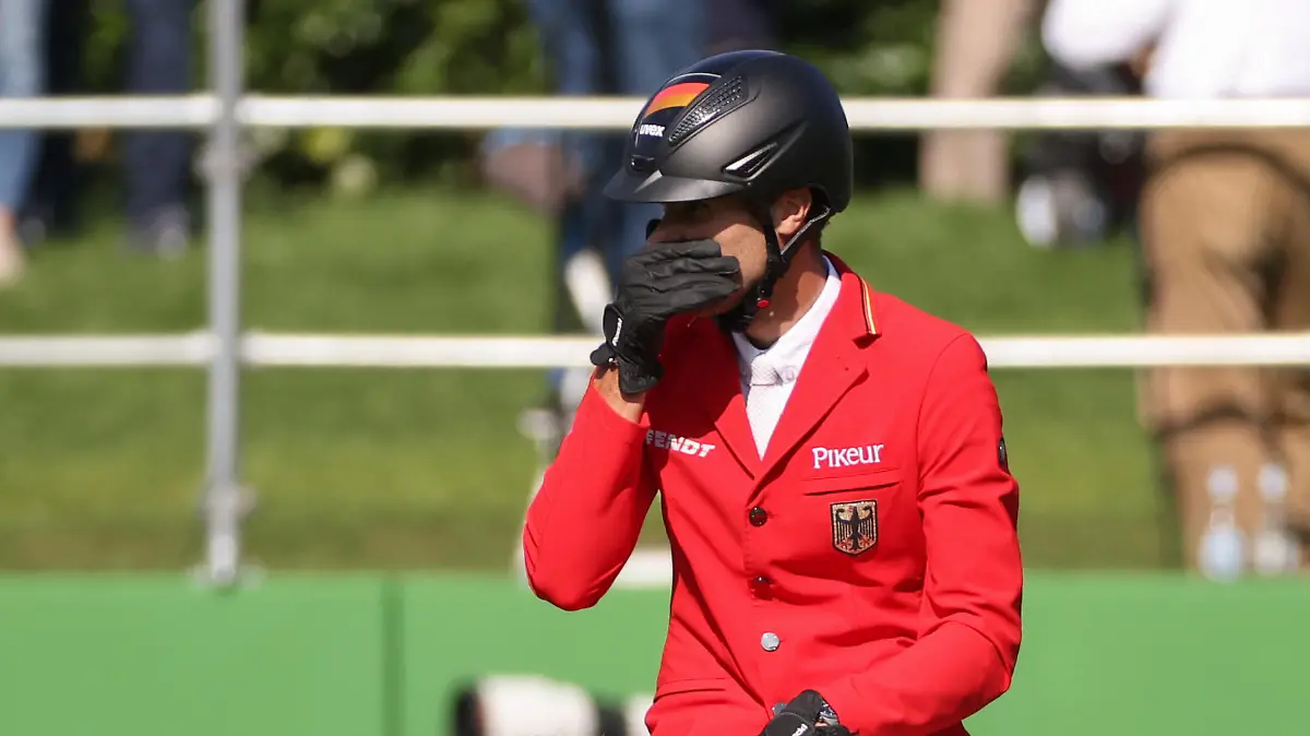 03.09.2021, Nordrhein-Westfalen, Riesenbeck: Pferdesport: Europameisterschaft, Springen. Der deutsche Springreiter Christian Kukuk reitet auf Mumbai. Foto: Friso Gentsch/dpa +++ dpa-Bildfunk +++