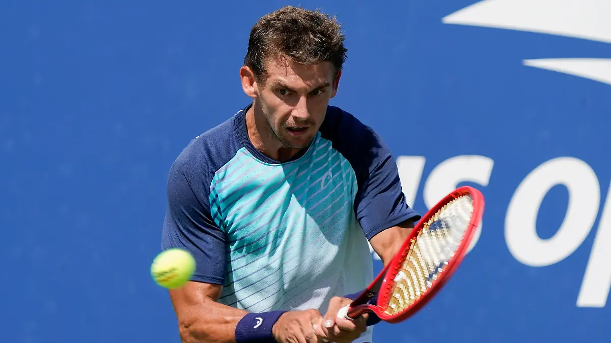 Henri Laaksonen, of Switzerland, returns a shot to Peter Gojowczyk, of Germany, during the third round of the US Open tennis championships, Friday, Sept. 3, 2021, in New York. (AP Photo/Seth Wenig)