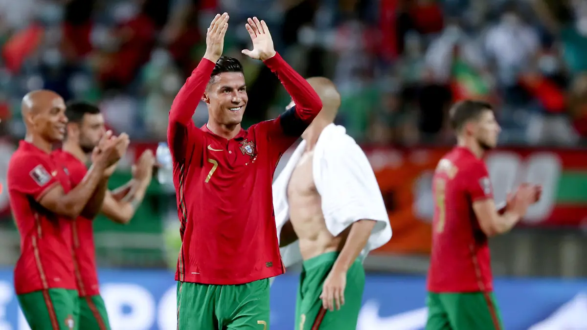 (210902) -- FARO, Sept. 2, 2021 (Xinhua) -- Portugal's Cristiano Ronaldo (front) celebrates after scoring a goal after the FIFA World Cup 2022 European qualifying round group A football match between Portugal and Ireland in Faro, Portugal, Sept. 1, 2021. (Photo by Pedro Fiuza/Xinhua)