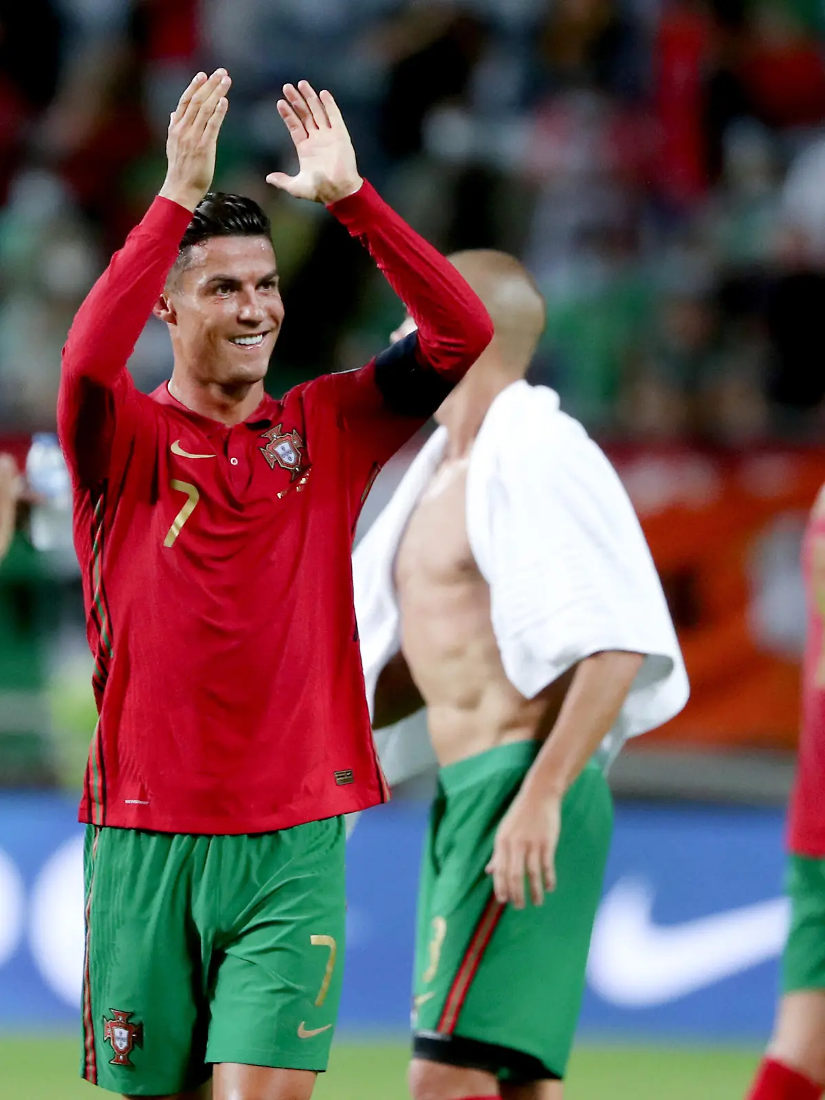 (210902) -- FARO, Sept. 2, 2021 (Xinhua) -- Portugal's Cristiano Ronaldo (front) celebrates after scoring a goal after the FIFA World Cup 2022 European qualifying round group A football match between Portugal and Ireland in Faro, Portugal, Sept. 1, 2021. (Photo by Pedro Fiuza/Xinhua)