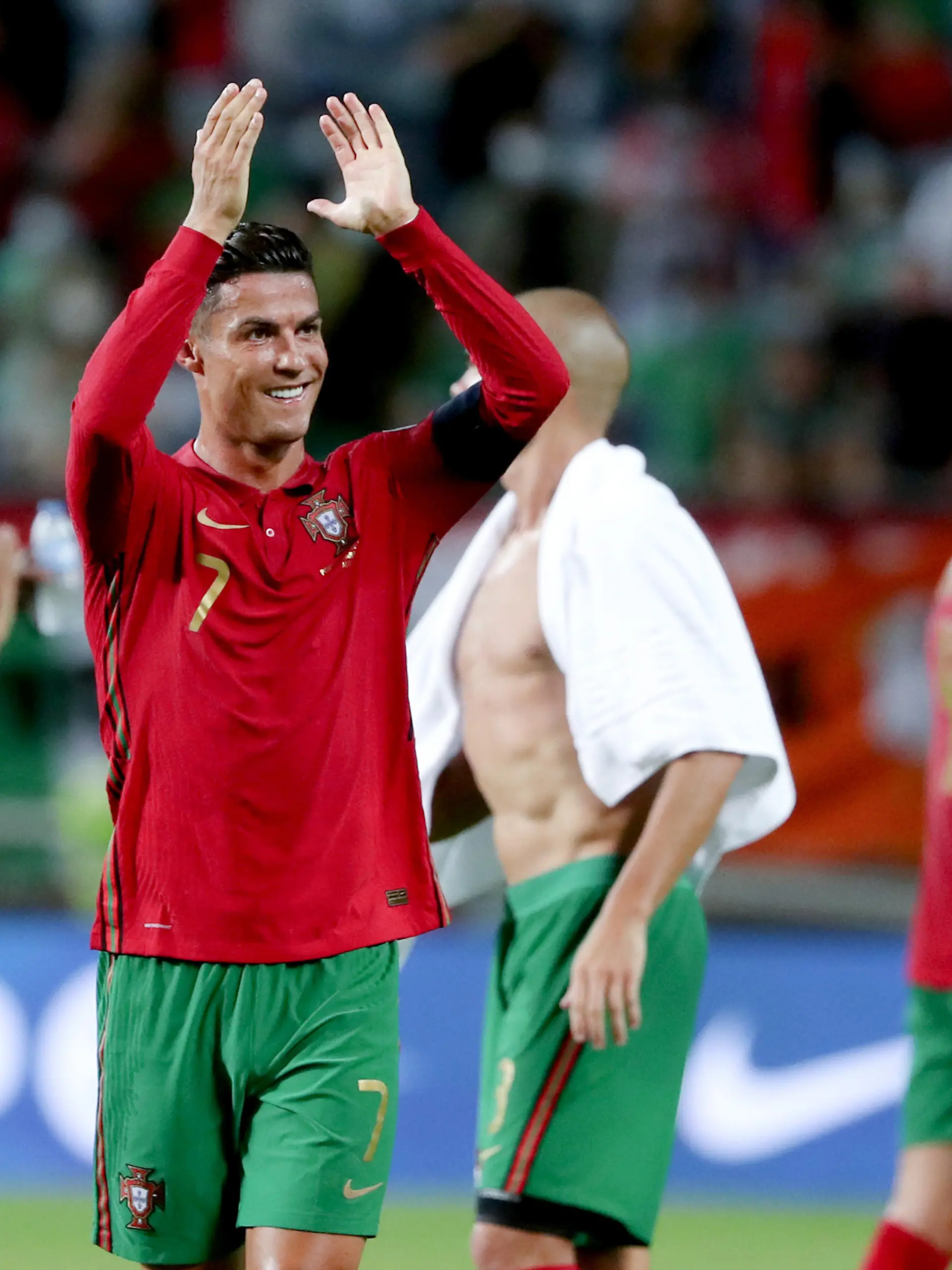 (210902) -- FARO, Sept. 2, 2021 (Xinhua) -- Portugal's Cristiano Ronaldo (front) celebrates after scoring a goal after the FIFA World Cup 2022 European qualifying round group A football match between Portugal and Ireland in Faro, Portugal, Sept. 1, 2021. (Photo by Pedro Fiuza/Xinhua)