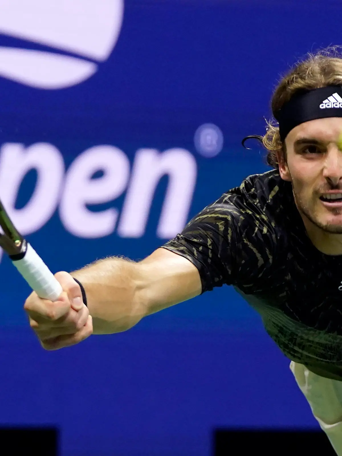 Stefanos Tsitsipas, of Greece, returns a shot against Adrian Mannarino, of France, during the second round of the US Open tennis championships, Wednesday, Sept. 1, 2021, in New York. (AP Photo/Frank Franklin II)