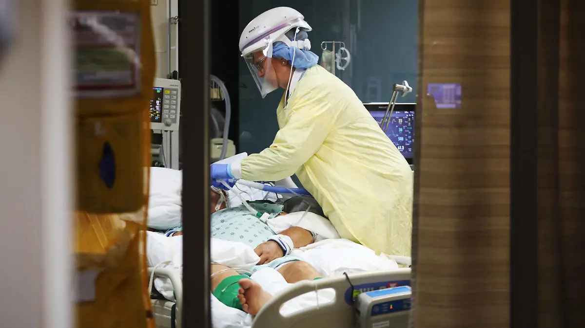July 20, 2021: Blessing Hospital nurse Lisa Surratt adjusts devices connected to a COVID-19 positive patient at the hospital s intensive care unit Thursday, July 8, 2021, in Quincy, Illinois. - ZUMAm67_ 20210720_zaf_m67_026 Copyright: xJohnxJ.xKimx