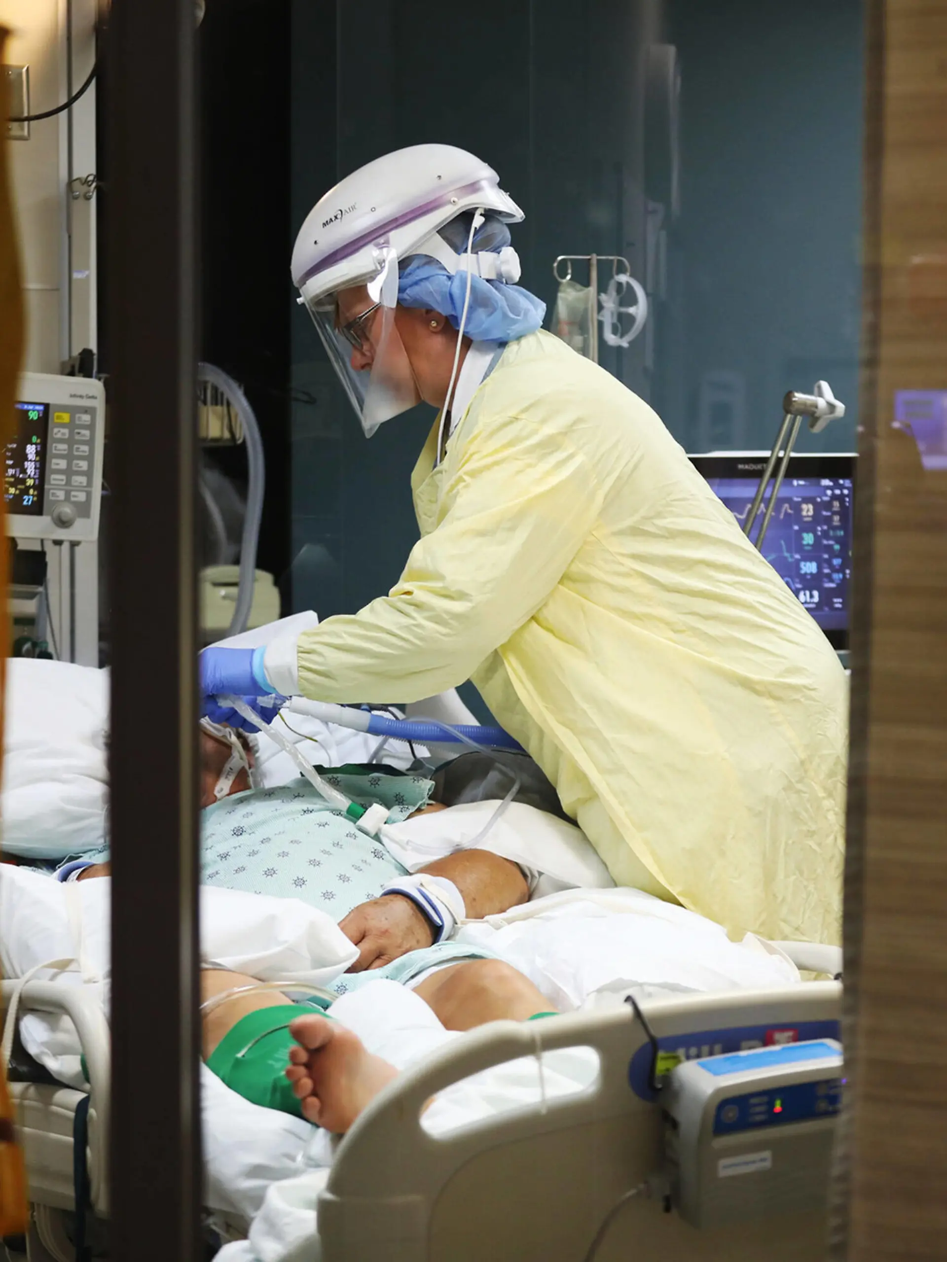 July 20, 2021: Blessing Hospital nurse Lisa Surratt adjusts devices connected to a COVID-19 positive patient at the hospital s intensive care unit Thursday, July 8, 2021, in Quincy, Illinois. - ZUMAm67_ 20210720_zaf_m67_026 Copyright: xJohnxJ.xKimx 