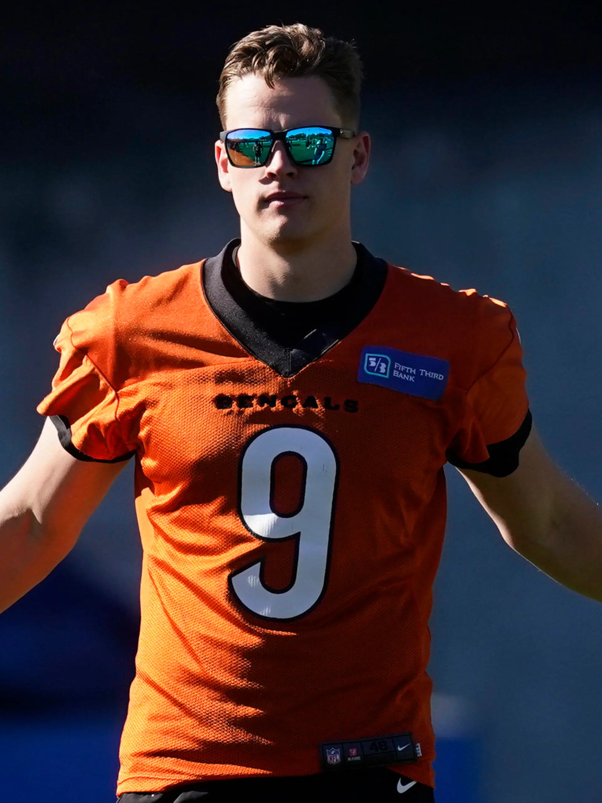 Cincinnati Bengals quarterback Joe Burrow (9) stretches during a walk through in an NFL football practice Saturday, Feb. 12, 2022, in Los Angeles. The Cincinnati Bengals play the Los Angeles Rams in the Super Bowl Sunday Feb. 13. (AP Photo/Marcio Jose Sanchez)