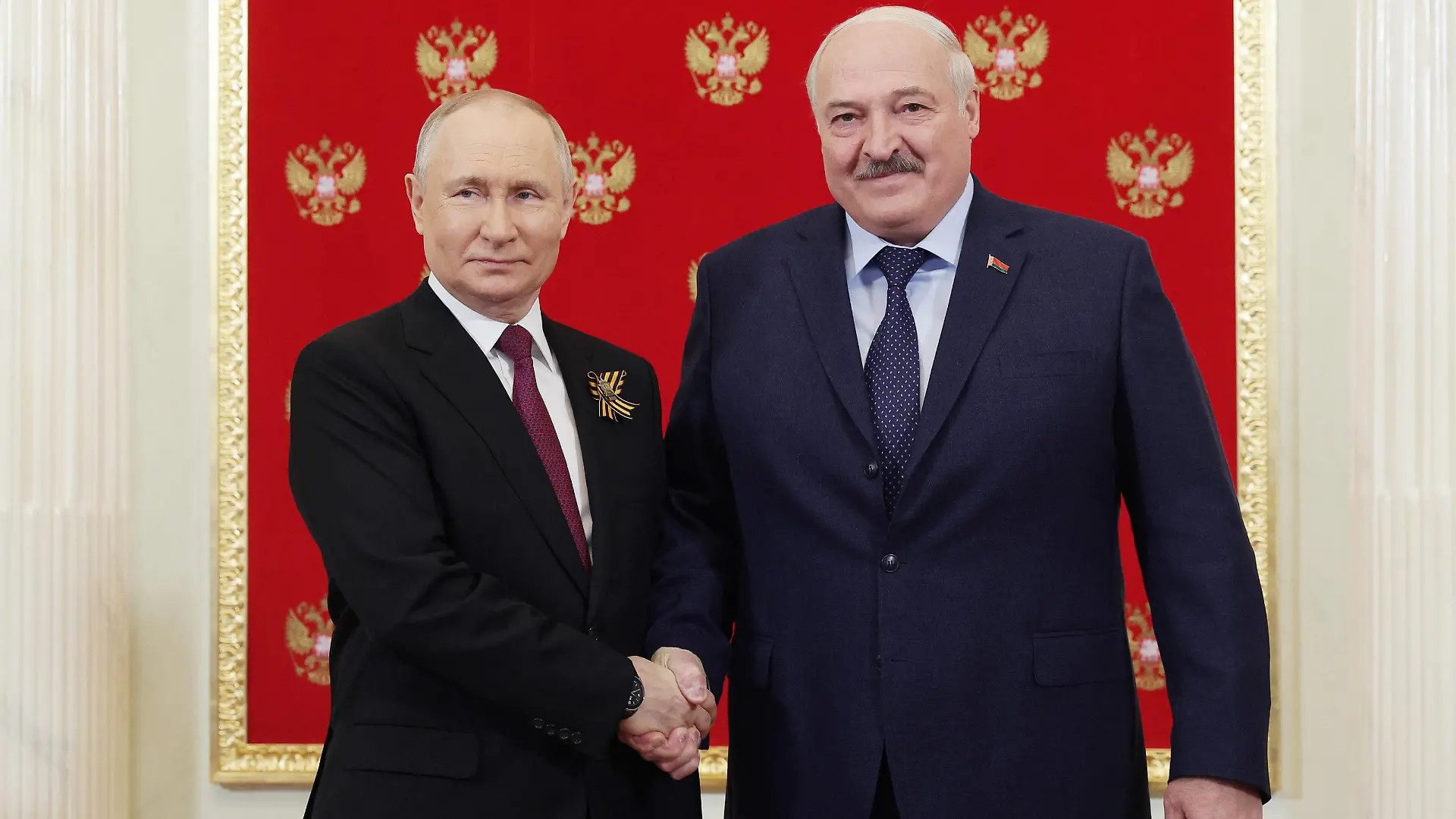 RUSSIA, MOSCOW - MAY 9, 2023: Russia s President Vladimir Putin L and his Belarusian counterpart Alexander Lukashenko shake hands during a meeting at the Moscow Kremlin ahead of a Victory Day parade in Red Square to mark 78 years since the victory over Nazi Germany in World War II. Vladimir Smirnov/TASS PUBLICATIONxINxGERxAUTxONLY 58962123