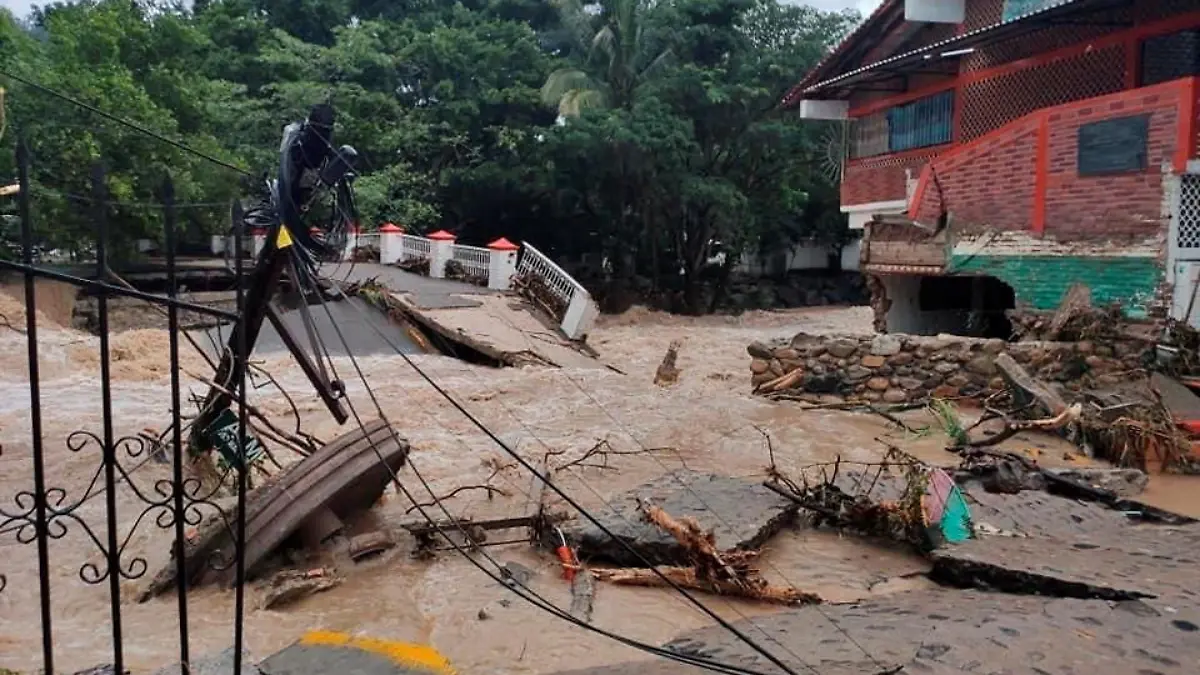 A general view shows a flooded and damaged street after Hurricane Nora pounds Mexico's coast with heavy rains and strong winds in Puerto Vallarta, Jalisco state, Mexico August 29, 2021. REUTERS/Alfonso Lepe NO RESALES. NO ARCHIVES