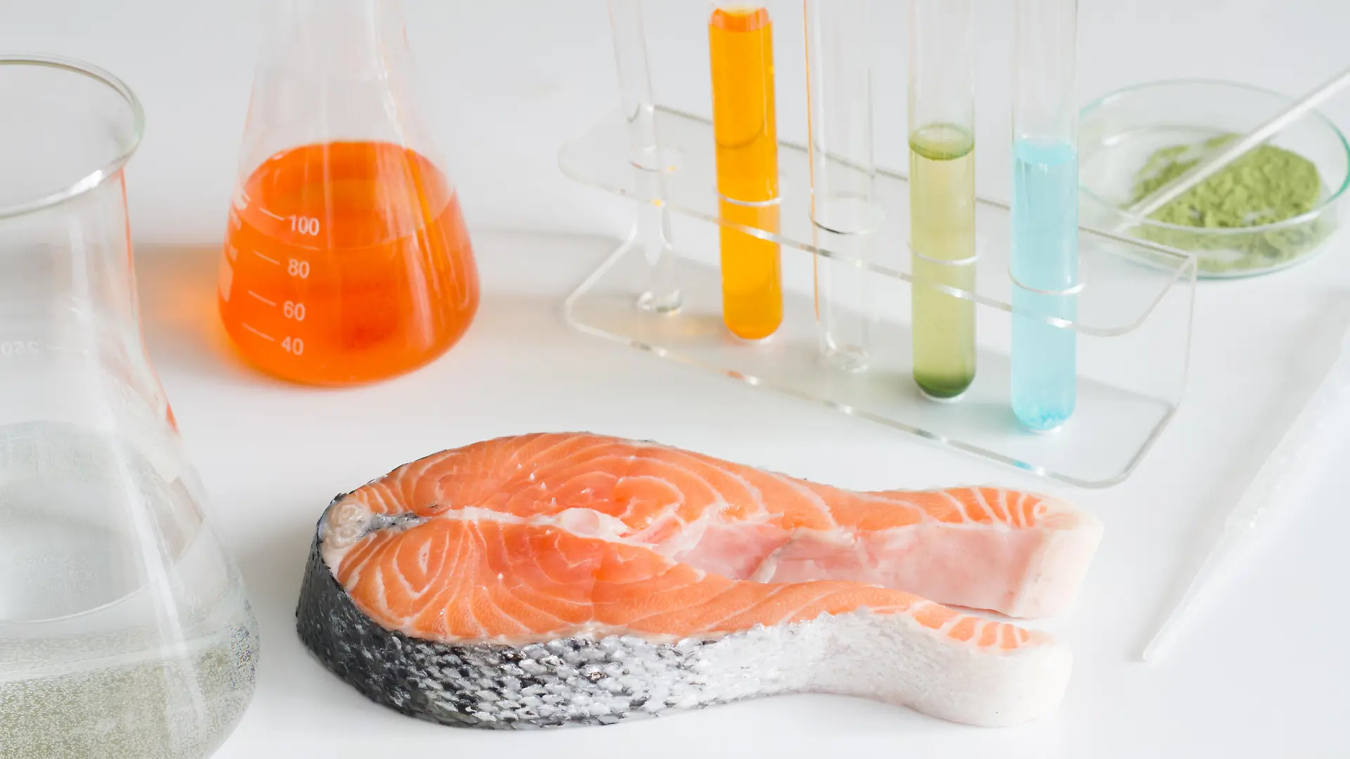 Test salmon fish in laboratory control of mercury and toxic dye closeup