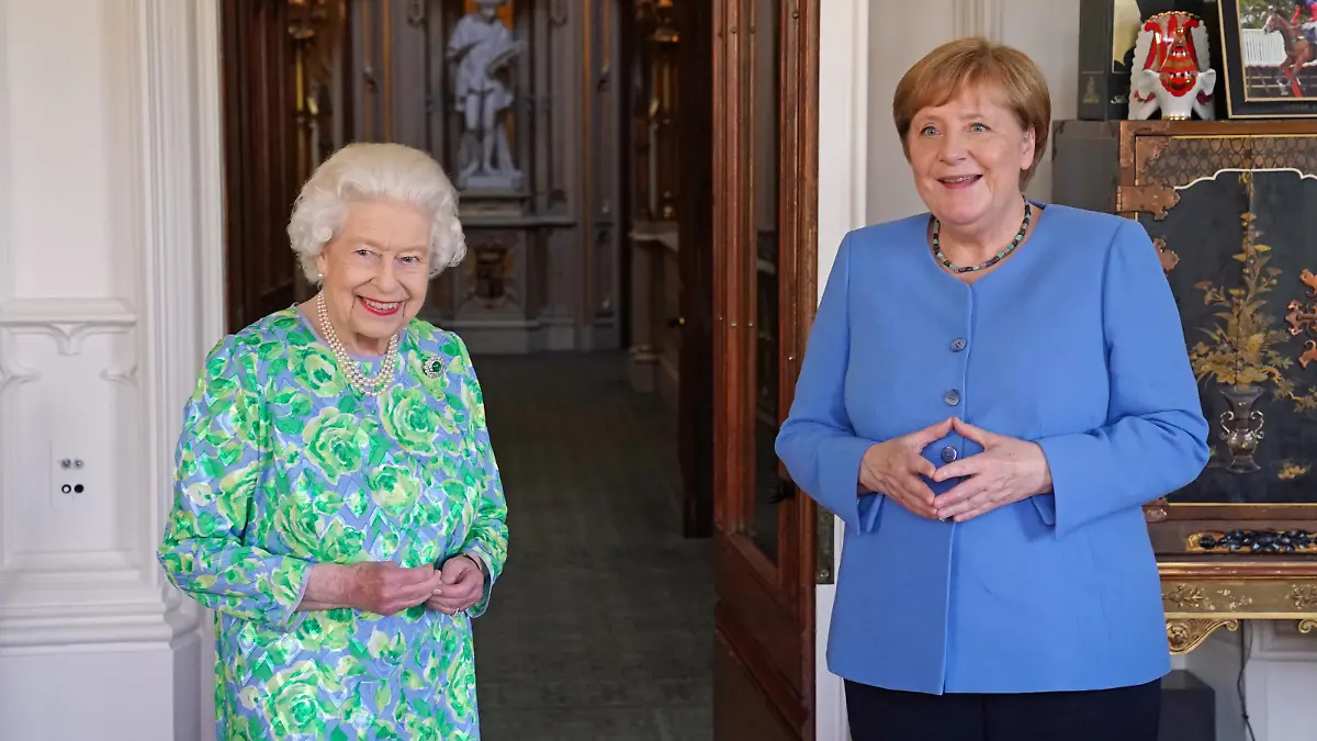 Angela Merkel visit to UK. Queen Elizabeth II receives the Chancellor of Germany, Angela Merkel, during an audience at Windsor Castle in Berkshire. Picture date: Friday July 2, 2021. See PA story ROYAL Merkel. Photo credit should read: Steve Parsons/PA Wire URN:60702012