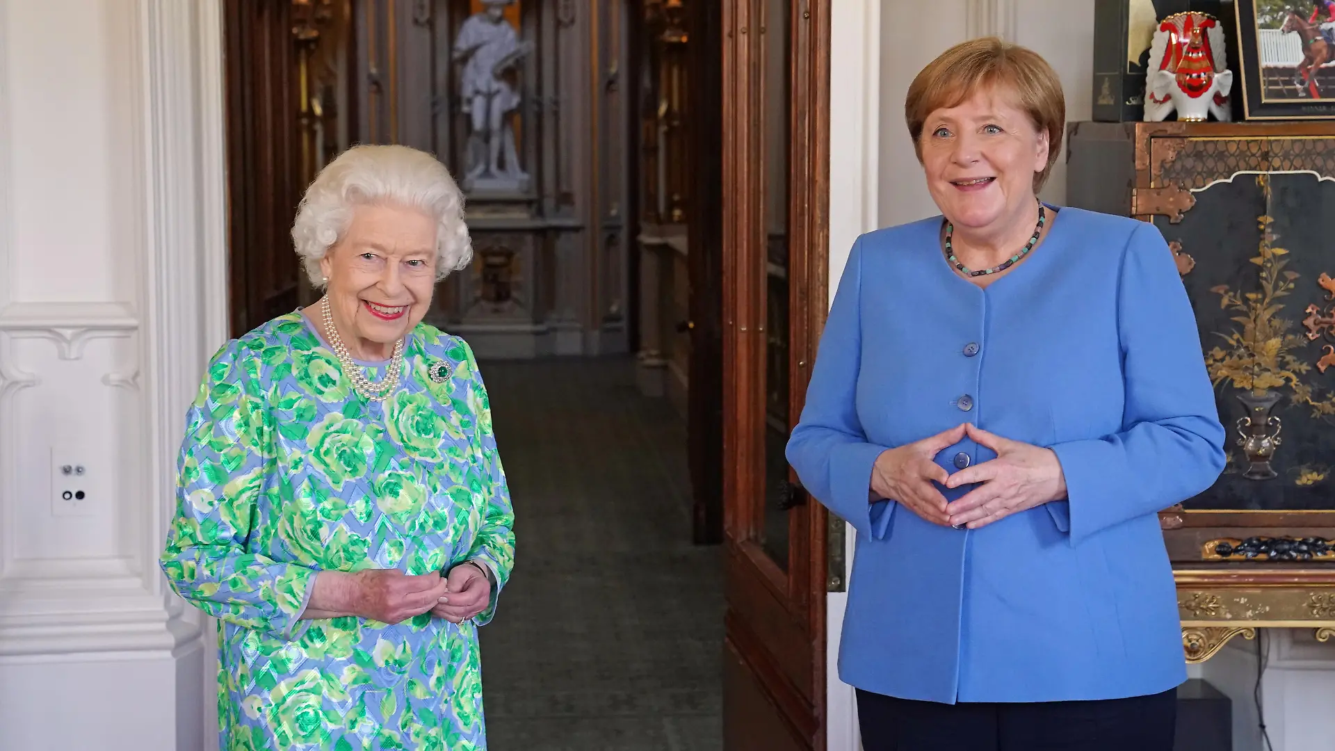 Angela Merkel visit to UK. Queen Elizabeth II receives the Chancellor of Germany, Angela Merkel, during an audience at Windsor Castle in Berkshire. Picture date: Friday July 2, 2021. See PA story ROYAL Merkel. Photo credit should read: Steve Parsons/PA Wire URN:60702012