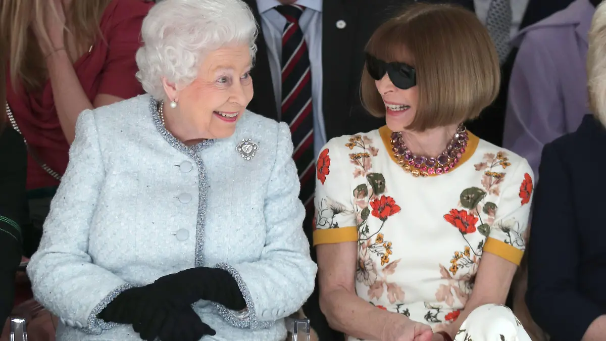 Royal visit to London Fashion Week. File photo dated 20/02/18 of Queen Elizabeth II next to Anna Wintour (right), as the American Vogue editor has been criticised by a royal expert labelling her decision to wear sunglasses while in conversation with the Queen at a London Fashion Week catwalk show has been labelled &quot;unacceptable&quot; and &quot;the height of bad manners.&quot; Issue date: Wednesday February 21, 2018. See PA story ROYAL Queen. Photo credit should read: Yui Mok/PA Wire URN:35134095