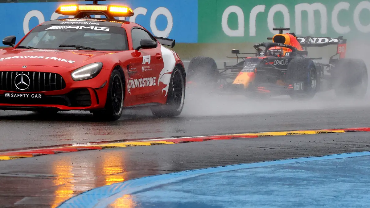 Red Bull driver Max Verstappen of the Netherlands steers his car behind the safety car during the Formula One Grand Prix at the Spa-Francorchamps racetrack in Spa, Belgium, Sunday, Aug. 29, 2021. (AP Photo/Olivier Matthys)