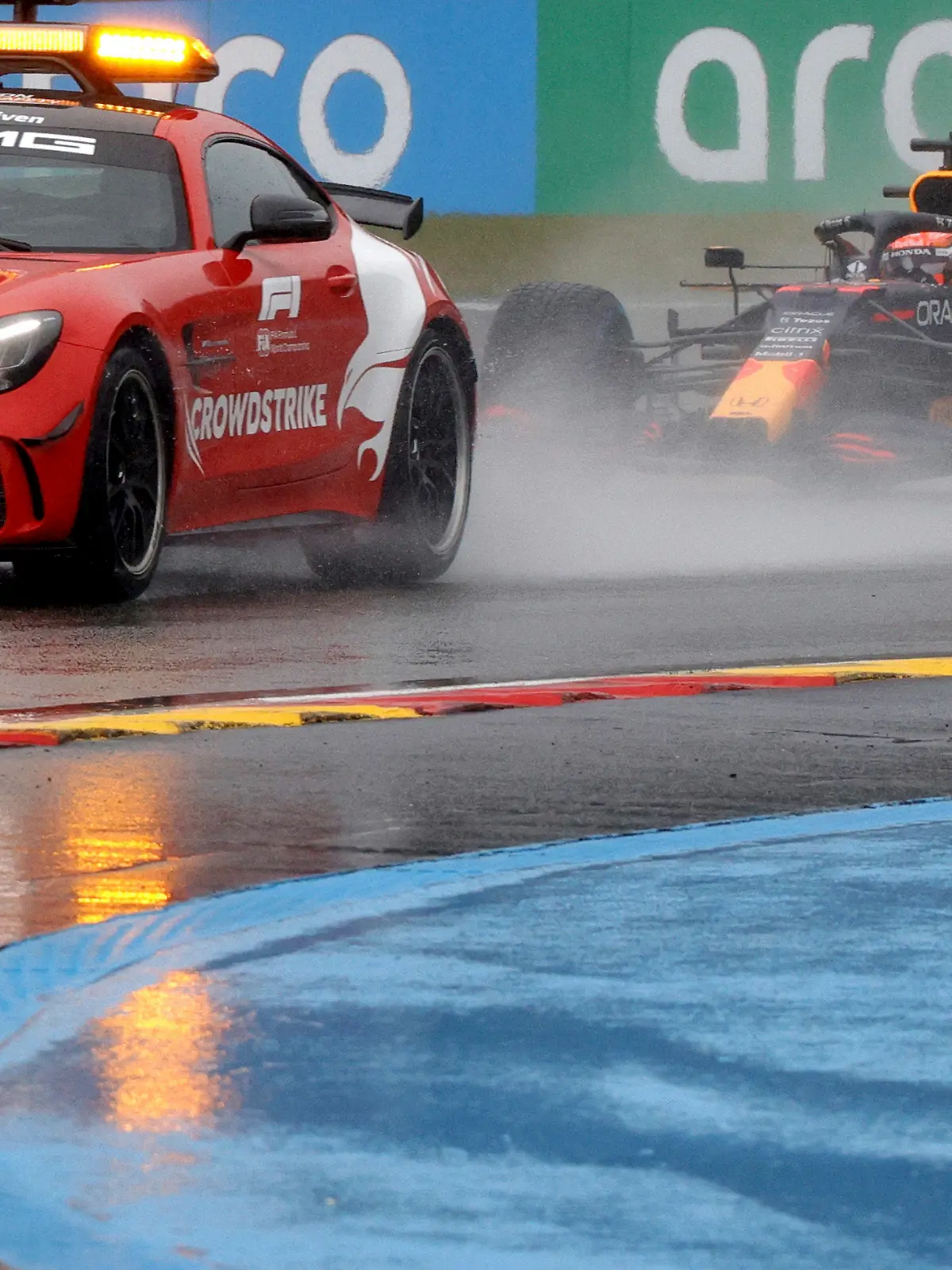 Red Bull driver Max Verstappen of the Netherlands steers his car behind the safety car during the Formula One Grand Prix at the Spa-Francorchamps racetrack in Spa, Belgium, Sunday, Aug. 29, 2021. (AP Photo/Olivier Matthys)