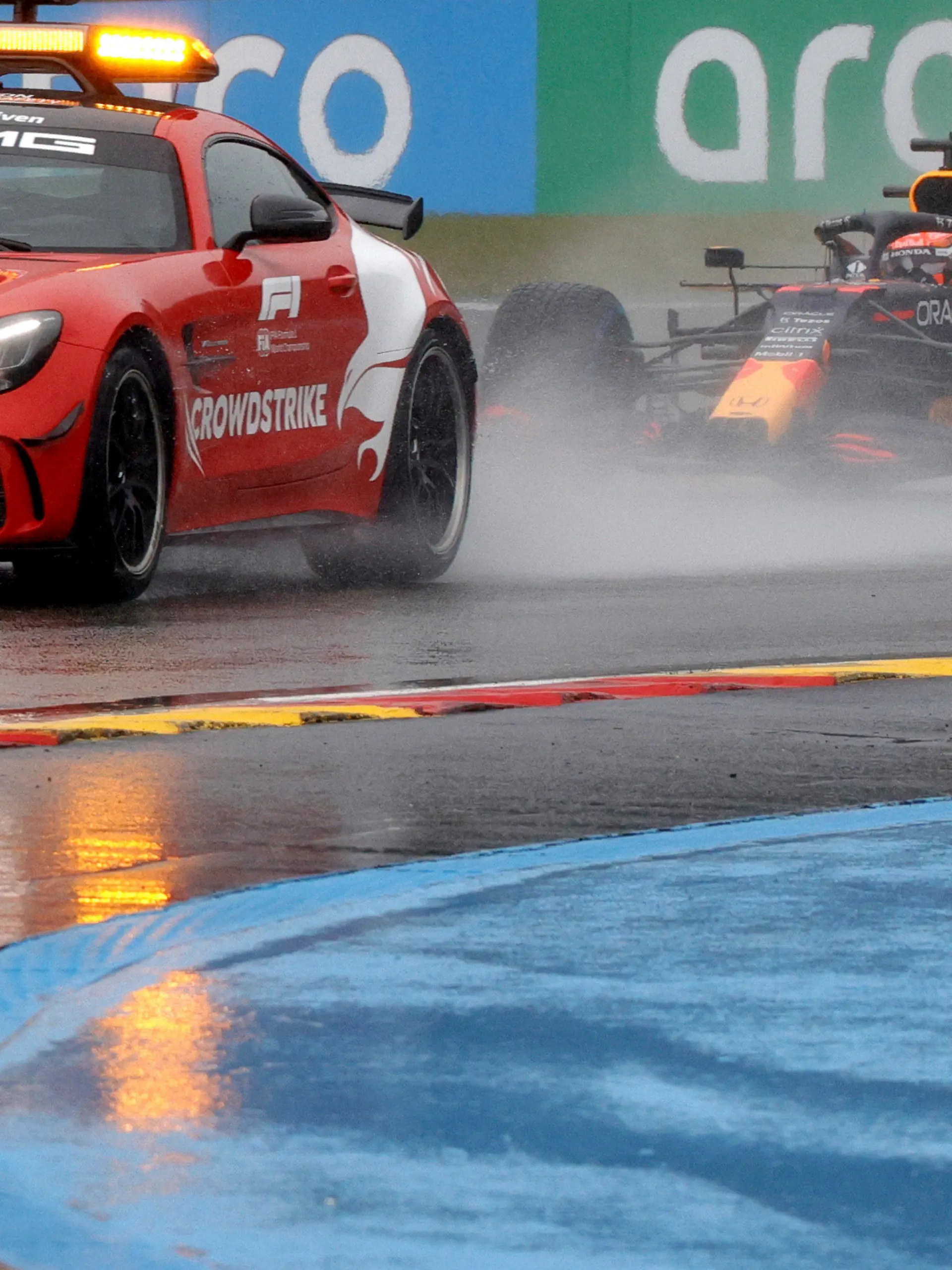 Red Bull driver Max Verstappen of the Netherlands steers his car behind the safety car during the Formula One Grand Prix at the Spa-Francorchamps racetrack in Spa, Belgium, Sunday, Aug. 29, 2021. (AP Photo/Olivier Matthys)