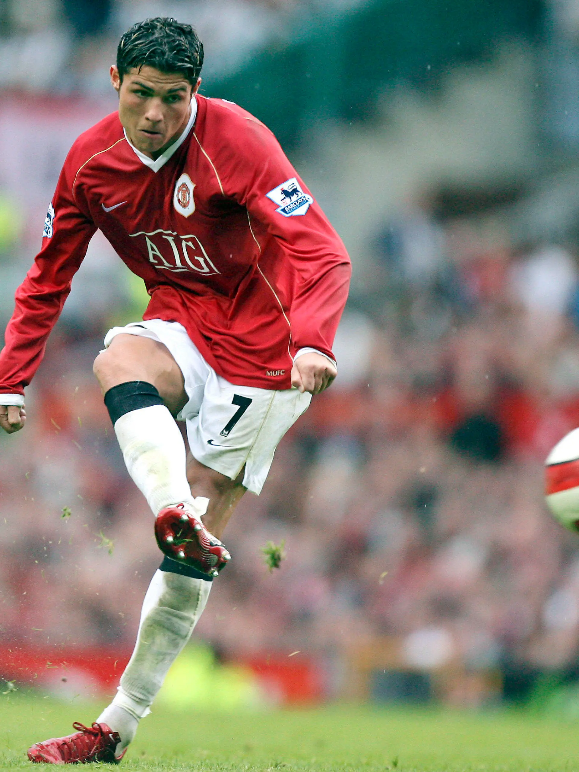 FILE - In this Oct. 1, 2006, file photo, Manchester United's Cristiano Ronaldo fires in a free kick against Newcastle during their English Premier League soccer match at Old Trafford Stadium, Manchester, England. Ronaldo is headed back to Manchester United. The English club said Friday, Aug. 27, 2021, it has reached an agreement with Juventus for the transfer of the 36-year-old Portugal forward, subject to agreement of personal terms, visa and a medical examination. (AP Photo/Jon Super, File)