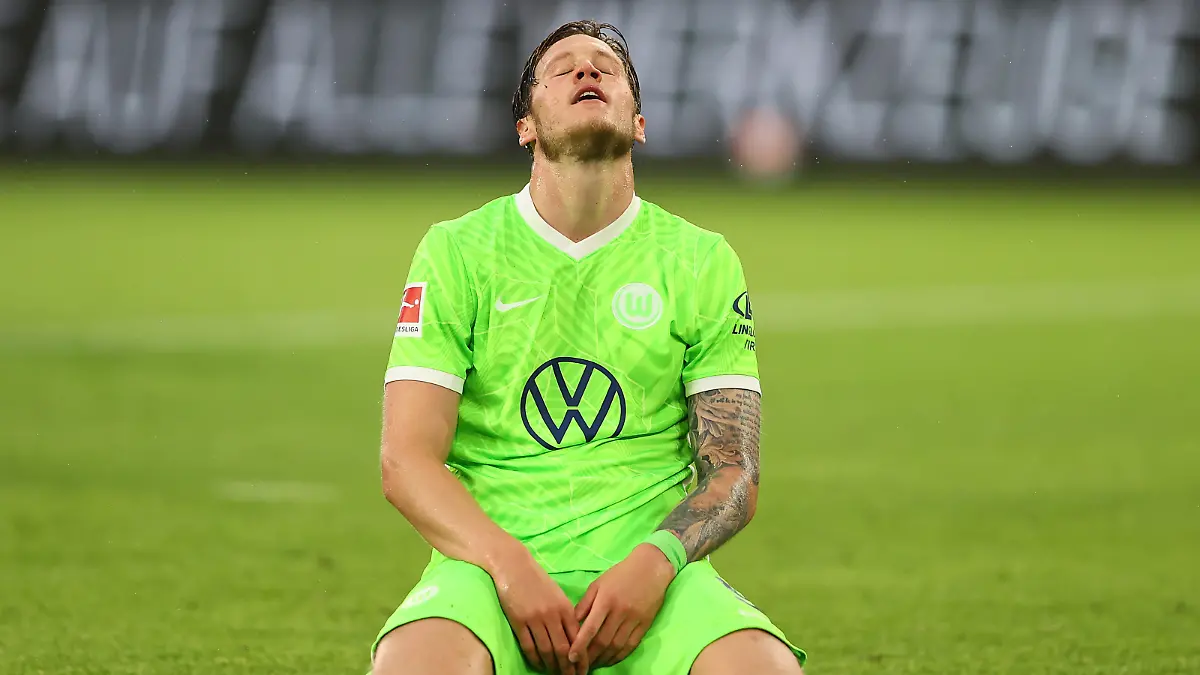 WOLFSBURG, GERMANY - AUGUST 29: Wout Weghorst of VfL Wolfsburg reacts during the Bundesliga match between VfL Wolfsburg and RB Leipzig at Volkswagen Arena on August 29, 2021 in Wolfsburg, Germany. (Photo by Martin Rose/Getty Images)