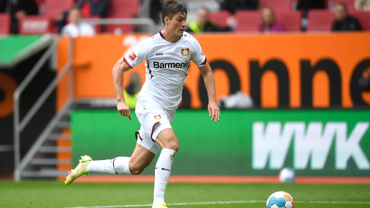 AUGSBURG, GERMANY - AUGUST 28: Patrik Schick of Bayer 04 Leverkusen runs with the ball during the Bundesliga match between FC Augsburg and Bayer 04 Leverkusen at WWK-Arena on August 28, 2021 in Augsburg, Germany. (Photo by Andreas Schaad/Getty Images)