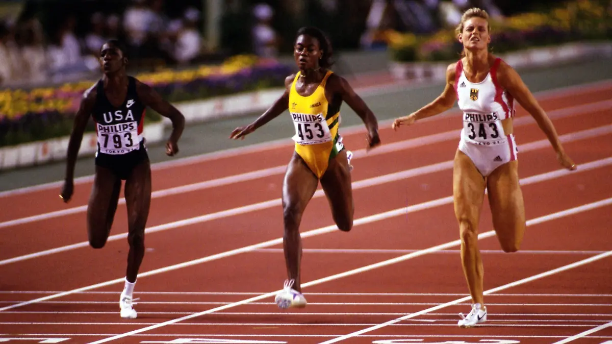  Katrin Krabbe Deutschland, re. als Erste im Ziel vor Gwen Torrence USA, li. und Merlene Ottey Jamaika