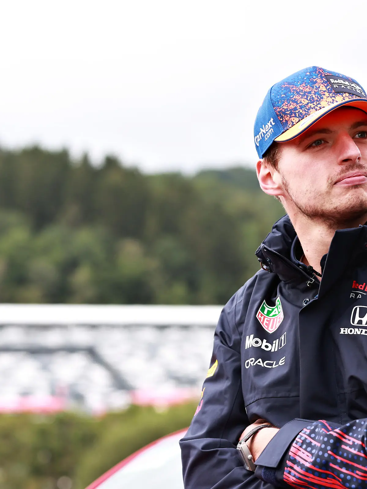 SPA, BELGIUM - AUGUST 26: Max Verstappen of Netherlands and Red Bull Racing looks on in the Paddock during previews ahead of the F1 Grand Prix of Belgium at Circuit de Spa-Francorchamps on August 26, 2021 in Spa, Belgium. (Photo by Mark Thompson/Getty Images)