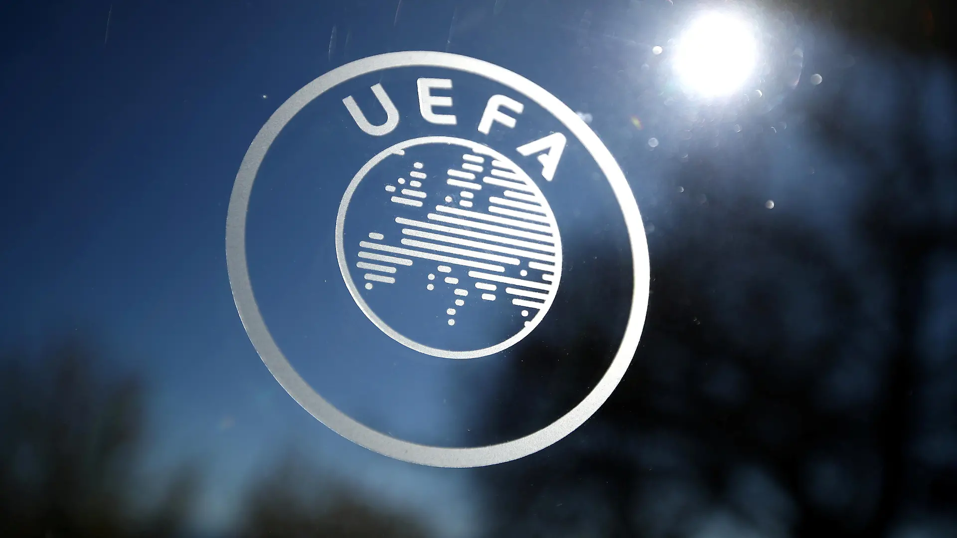 FILE PHOTO: Soccer Football - Europa League - Round of 16 draw - Nyon, Switzerland - February 28, 2020 General view of the UEFA logo at UEFA Headquarters before the draw REUTERS/Denis Balibouse/File Photo
