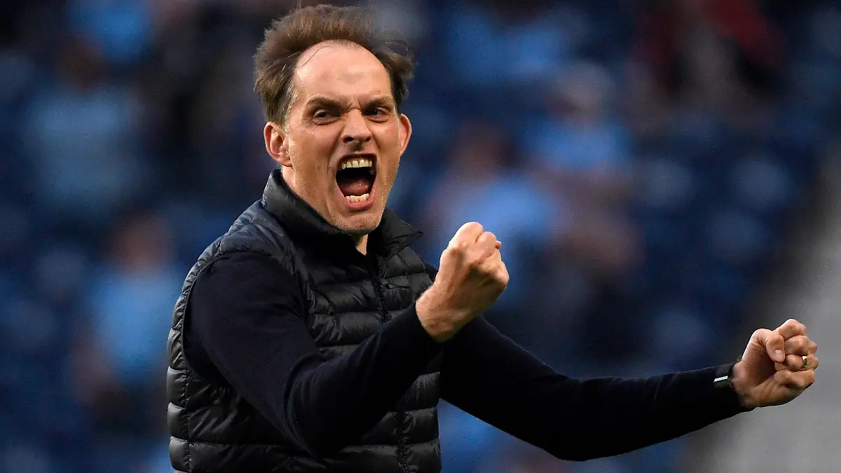 ARCHIV - 29.05.2021, Portugal, Porto: Fußball: Champions League, Manchester City - FC Chelsea, K.o.-Runde, Finale im Estadio do Dragao: Chelseas Trainer Thomas Tuchel feiert das Tor zum 0:1 durch Havertz. (zu «Vor den UEFA-Wahlen: Die möglichen Preisträger im Überblick») Foto: Pierre Philippe Marcou/Pool AFP/AP/dpa +++ dpa-Bildfunk +++
