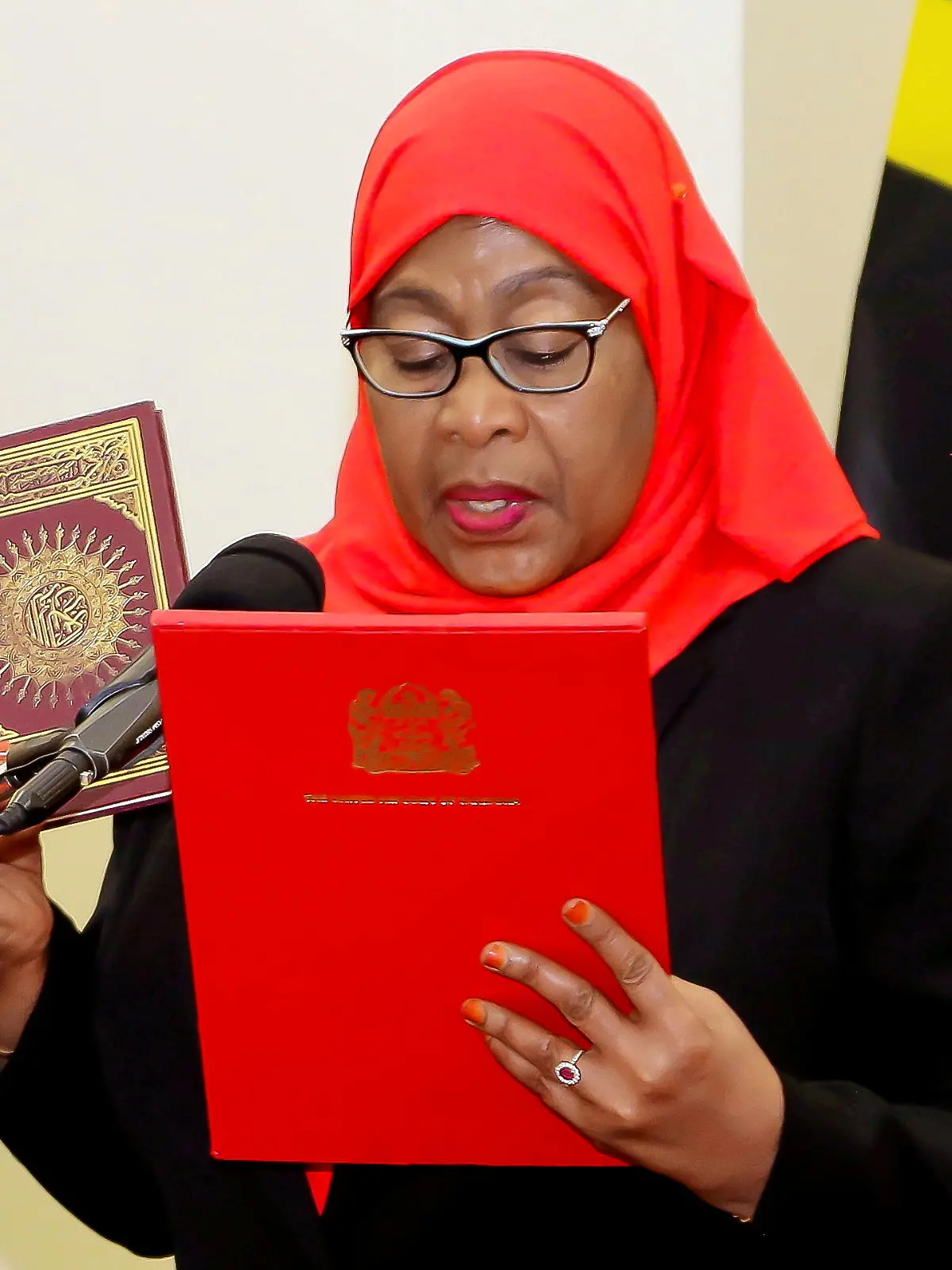 FILE PHOTO: Tanzania's new President Samia Suluhu Hassan takes oath of office following the death of her predecessor John Pombe Magufuli at State House in Dar es Salaam, Tanzania March 19, 2021. REUTERS/Stringer/File Photo