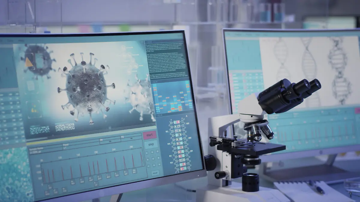 Modern laboratory interior. Coronavirus research. Word Covid-19 on the screen