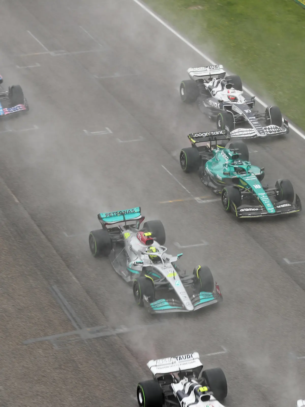  24th April 2022 Imola, Emilia Romagna, Italy. F1 Grand Prix of Italy, Race Day: Mercedes AMG Petronas F1 Team, Lewis Hamilton and Aston Martin Aramco Cognizant F1 Team, Lance Stroll PUBLICATIONxNOTxINxUK ActionPlus12382889 Octane