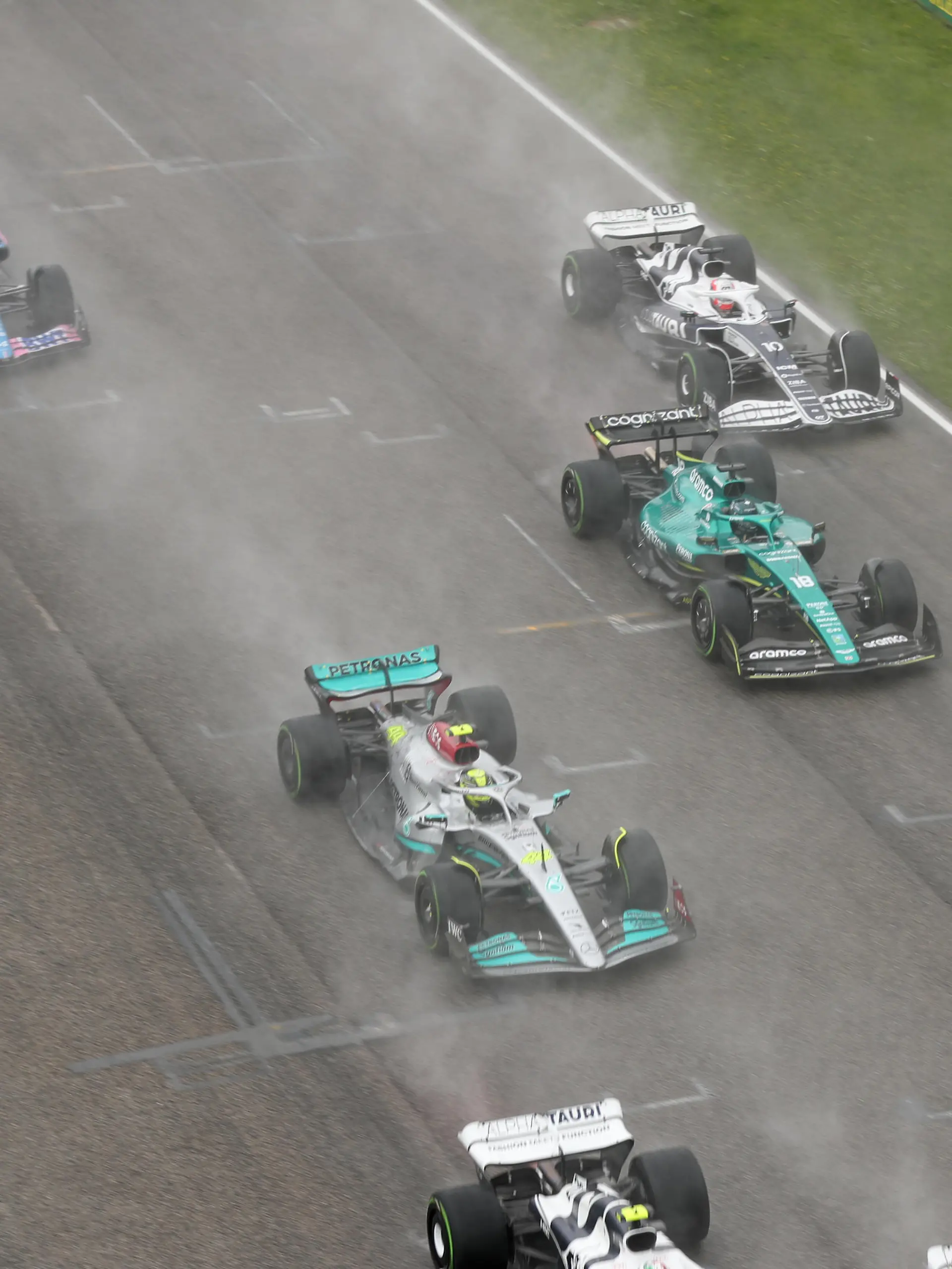  24th April 2022 Imola, Emilia Romagna, Italy. F1 Grand Prix of Italy, Race Day: Mercedes AMG Petronas F1 Team, Lewis Hamilton and Aston Martin Aramco Cognizant F1 Team, Lance Stroll PUBLICATIONxNOTxINxUK ActionPlus12382889 Octane