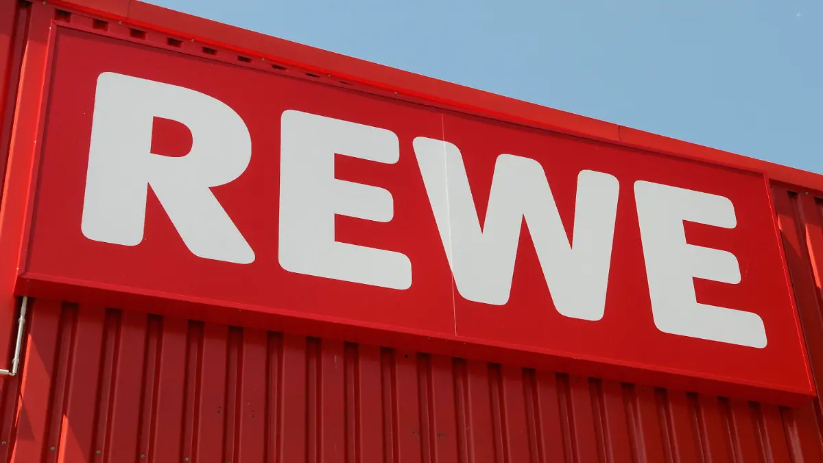 epa04142962 (FILE) A file photo dated 05 July 2010 showing REWE company logo outside a REWE store in Frankfurt, Germany. REWE Group, one of the leading trading and travel and tourism companies in Europe, on 27 March 2014 reported a revenue of 13.21 billion euro, an increase of 4,16 per cent compared with the previous year. The company created 1.700 new jobs. In 2014, Rewe Group plans investments of some 500 million euro. EPA/MAURITZ ANTIN