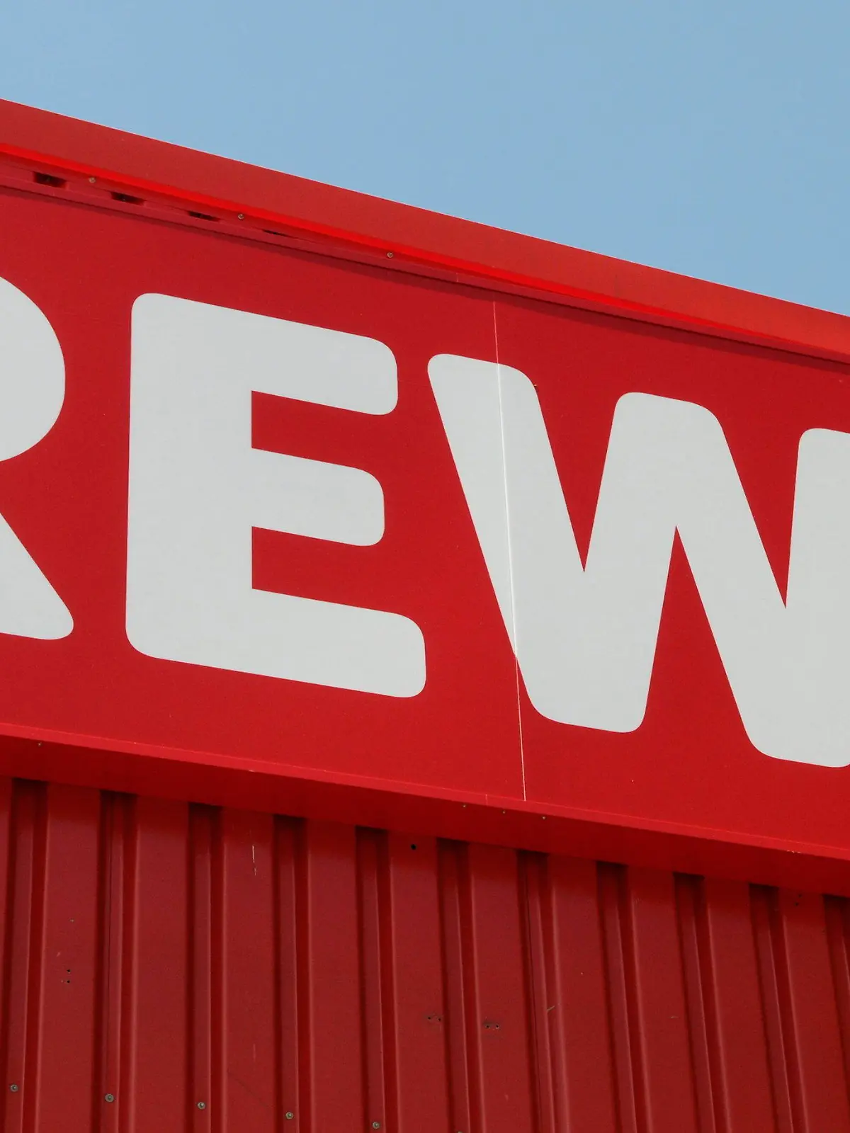 epa04142962 (FILE) A file photo dated 05 July 2010 showing REWE company logo outside a REWE store in Frankfurt, Germany. REWE Group, one of the leading trading and travel and tourism companies in Europe, on 27 March 2014 reported a revenue of 13.21 billion euro, an increase of 4,16 per cent compared with the previous year. The company created 1.700 new jobs. In 2014, Rewe Group plans investments of some 500 million euro. EPA/MAURITZ ANTIN