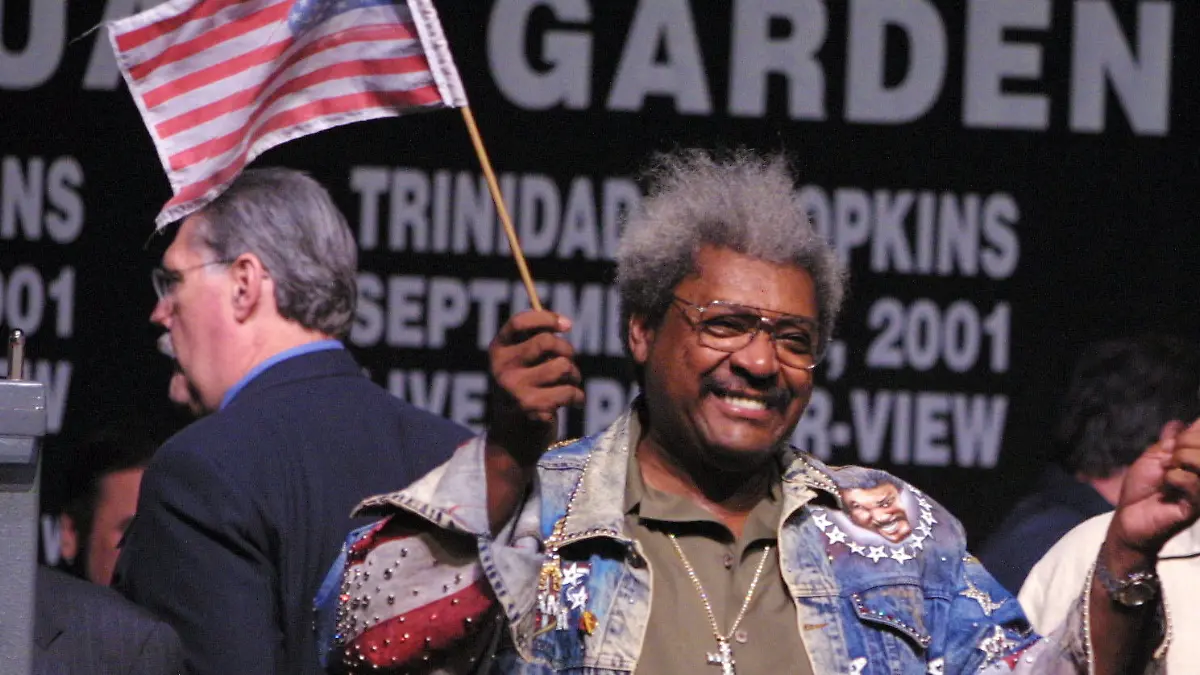 28 Sep 2001: Don King holds up American flags at the Bernard Hopkins vs Felix Trinidad weigh in for the middleweight unification fight at Madison Square Garden in New York City. DIGITAL IMAGE Mandatory Credit: Al Bello/ALLSPORT