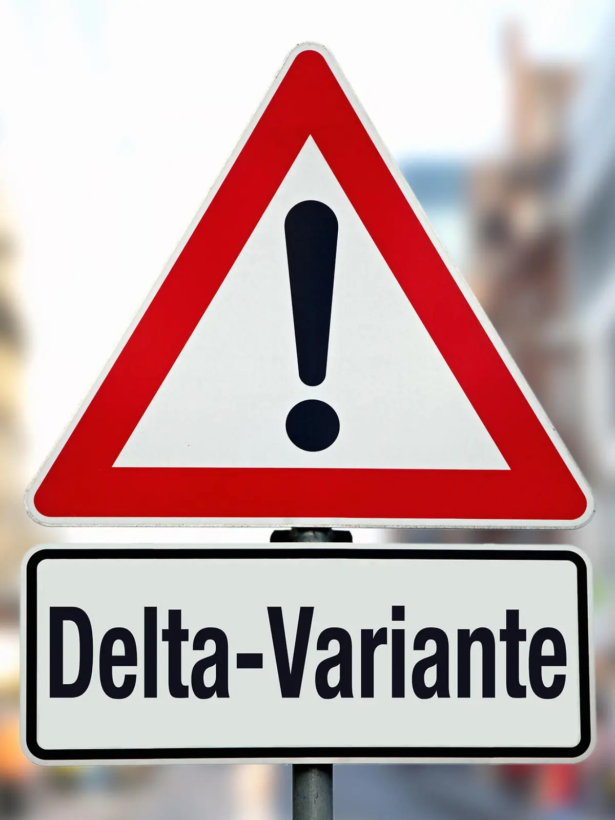 Ein Hinweisschild mit der Aufschrift "Delta-Variante"
