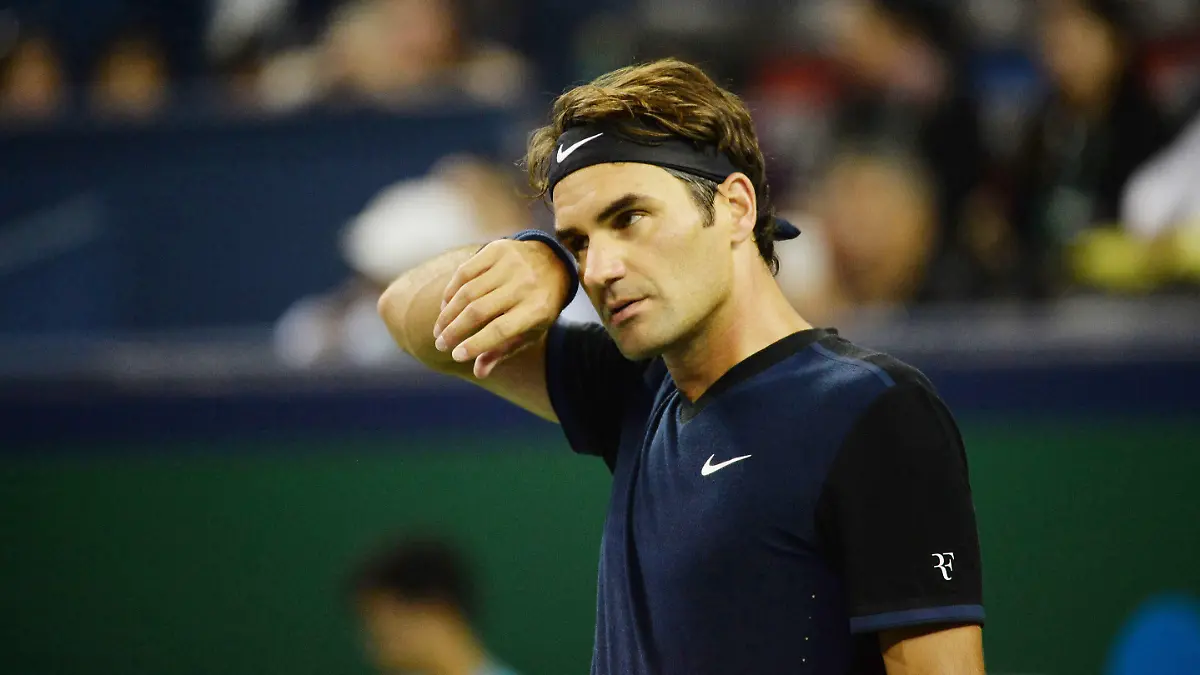 Roger Federer of Switzerland returns a shot to Albert Ramos-Vinolas of Spain in their second round match of the men's singles during the 2015 Shanghai Rolex Masters tennis tournament in Shanghai, China, 13 October 2015.

Roger Federer of Switzerland was defeated by Albert Ramos-Vinolas of Spain 1-2 (6-7/6-2/3-6) in their second round match of the men's singles during the 2015 Shanghai Rolex Masters tennis tournament in Shanghai, China, 13 October 2015.
<P>

<B>Ref: SPL1150522  131015  </B><BR/>
Picture by: Imaginechina / Splash News<BR/>
</P><P>
<B>Splash News and Pictures</B><BR/>
Los Angeles:	310-821-2666<BR/>
New York:	212-619-2666<BR/>
London:	870-934-2666<BR/>
photodesk@splashnews.com<BR/>
</P>