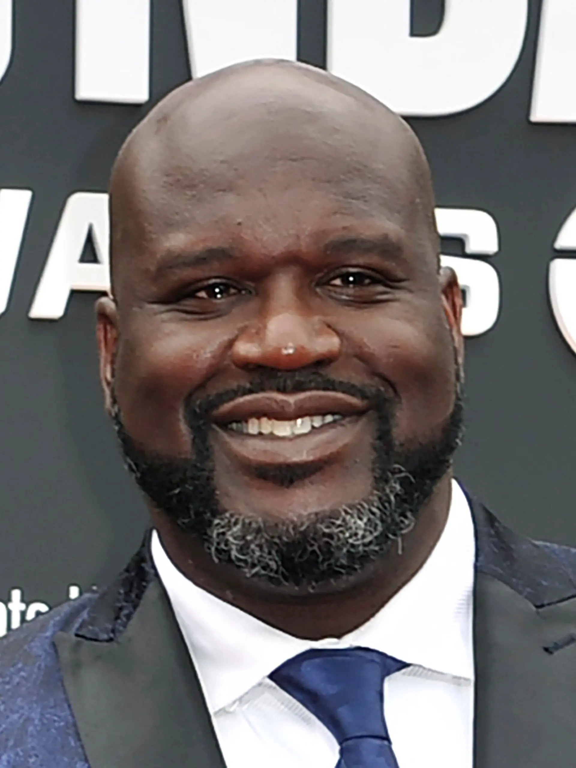 FILE - This June 24, 2019, file photo shows Shaquille O'Neal at the NBA Awards in Santa Monica, Calif. A woman whose car was left stranded along a Florida interstate when her tire blew out got a little unexpected help from former NBA star Shaquille O'Neal, sheriff's officials say. O'Neal, who lives in the Orlando area, was traveling on Interstate 75 near Gainesville on Monday, July 13, 2020, when he saw the woman pull onto the side of the road, the Alachua County Sheriff’s Office said on a Facebook post. He stayed with the woman until deputies arrived at the scene. “He fist-bumped Deputies Purington and Dillon before going on his way,” the sheriff’s office wrote on Facebook.  (Photo by Richard Shotwell/Invision/AP, File)