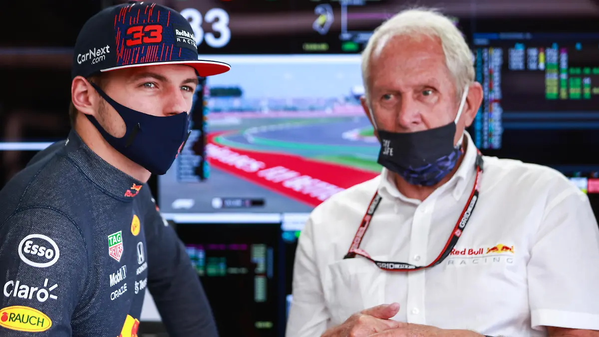 NORTHAMPTON, ENGLAND - JULY 17: Max Verstappen of Netherlands and Red Bull Racing and Red Bull Racing Team Consultant Dr Helmut Marko look on in the garage during practice ahead of the F1 Grand Prix of Great Britain at Silverstone on July 17, 2021 in Northampton, England. (Photo by Mark Thompson/Getty Images)