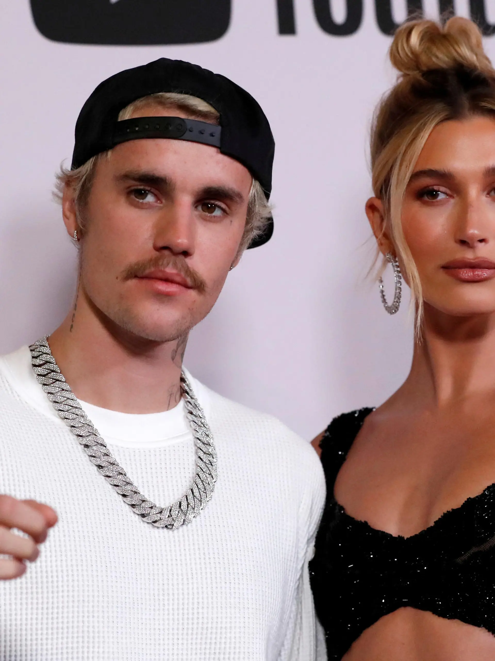 FILE PHOTO: Singer Justin Bieber and his wife Hailey Baldwin pose at the premiere for the documentary television series "Justin Bieber: Seasons" in Los Angeles, California, U.S., January 27, 2020. REUTERS/Mario Anzuoni/File Photo