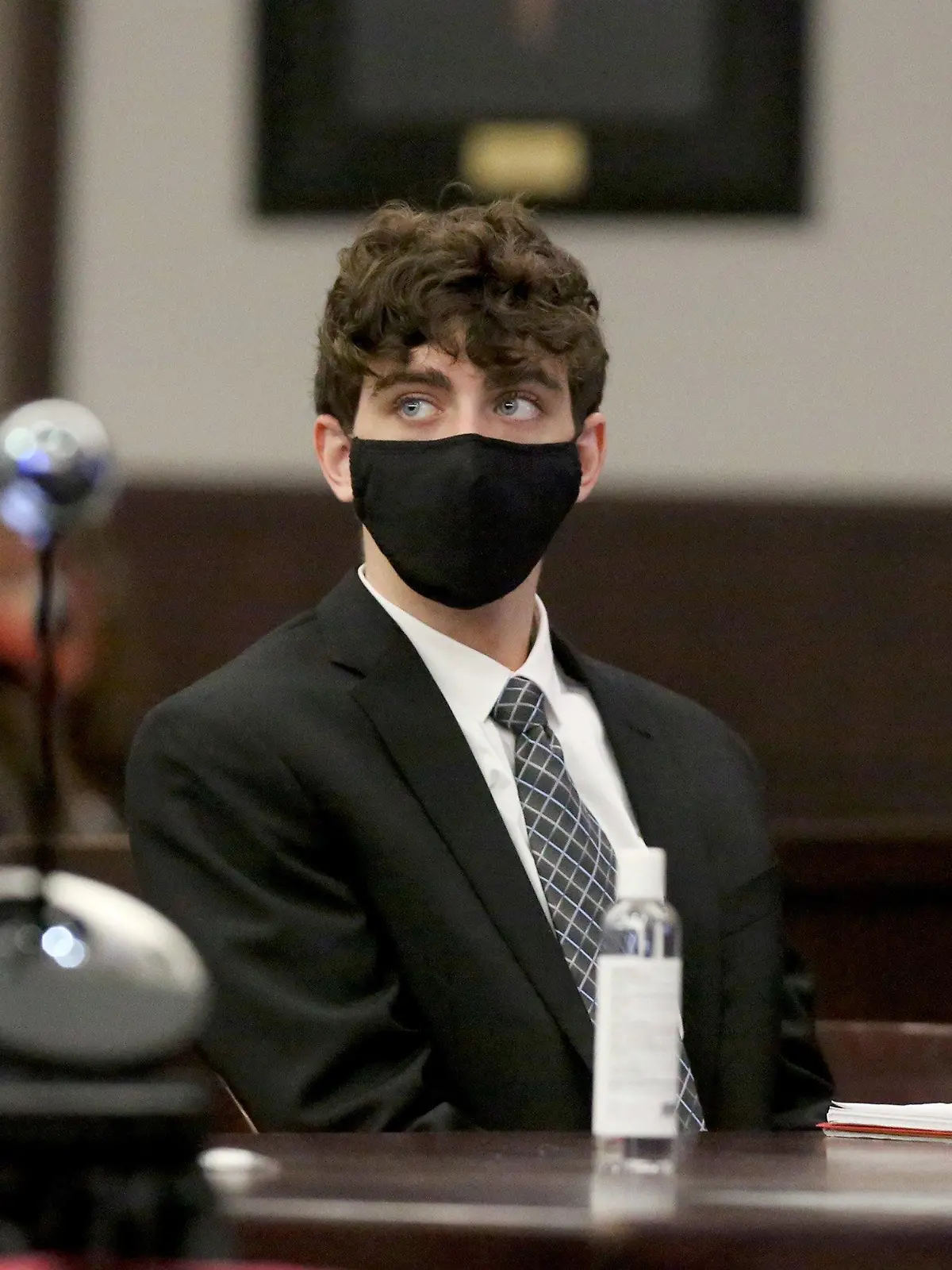 April 8, 2021, TAMPA, Florida, USA: Cameron Herrin listens to testimony during his sentencing hearing on Thursday, April 8, 2021, at the Hillsborough County Edgecomb Courthouse before 13th Judicial Circuit Court judge Christopher Nash in downtown Tampa. Herrin was the driver of a Ford Mustang that collided with a mother and daughter on Bayshore Boulevard in 2018, as Herrin, who was then 18, was racing another driver, John Barrineau. The Mustang hit Jessica Reisinger-Raubenolt, who was pushing her 21-month-old daughter, Lillia, in a stroller across the iconic Tampa roadway. Both Herrin and Barrineau pleaded guilty late last year to vehicular homicide. Barrineau made a plea deal and was sentenced to six years in prison. Herrin has left it up to judge to decide what his penalty should be. He faces a maximum of 30 years in prison. Sentencing guidelines suggest about 18 years. (Credit Image: Â© Douglas R. Clifford/Tampa Bay Times via ZUMA Wire