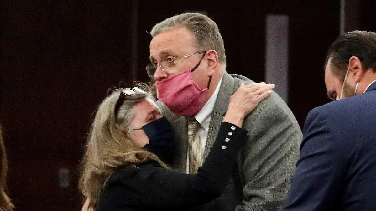 April 8, 2021, TAMPA, Florida, USA: Jessica Reisinger-RaubenoltÃ¢â¬â¢s parents, Pamela Reisinger, center, hugs Bob Reisinger, moments after Cameron Herrin is sentenced to 24 years in prison on Thursday, April 8, 2021, at the Hillsborough County Edgecomb Courthouse before 13th Judicial Circuit Court judge Christopher Nash in downtown Tampa. David Raubenolt, center, is flanked by family while attending Cameron HerrinÃ¢â¬â¢s sentencing hearing on Thursday, April 8, 2021, at the Hillsborough County Edgecomb Courthouse before 13th Judicial Circuit Court judge Christopher Nash in downtown Tampa. Herrin was the driver of a Ford Mustang that collided with a mother and daughter on Bayshore Boulevard in 2018, as Herrin, who was then 18, was racing another driver, John Barrineau. The Mustang hit DavidÃ¢â¬â¢s wife, Jessica Reisinger-Raubenolt, who was pushing thier 21-month-old daughter, Lillia, in a stroller across the iconic Tampa roadway. Both Herrin and Barrineau pleaded guilty late last year to vehicular homicide. Barrineau made a plea deal and was sentenced to six years in prison. Herrin has left it up to judge to decide what his penalty should be. (Credit Image: Â© Douglas R. Clifford/Tampa Bay Times via ZUMA Wire
