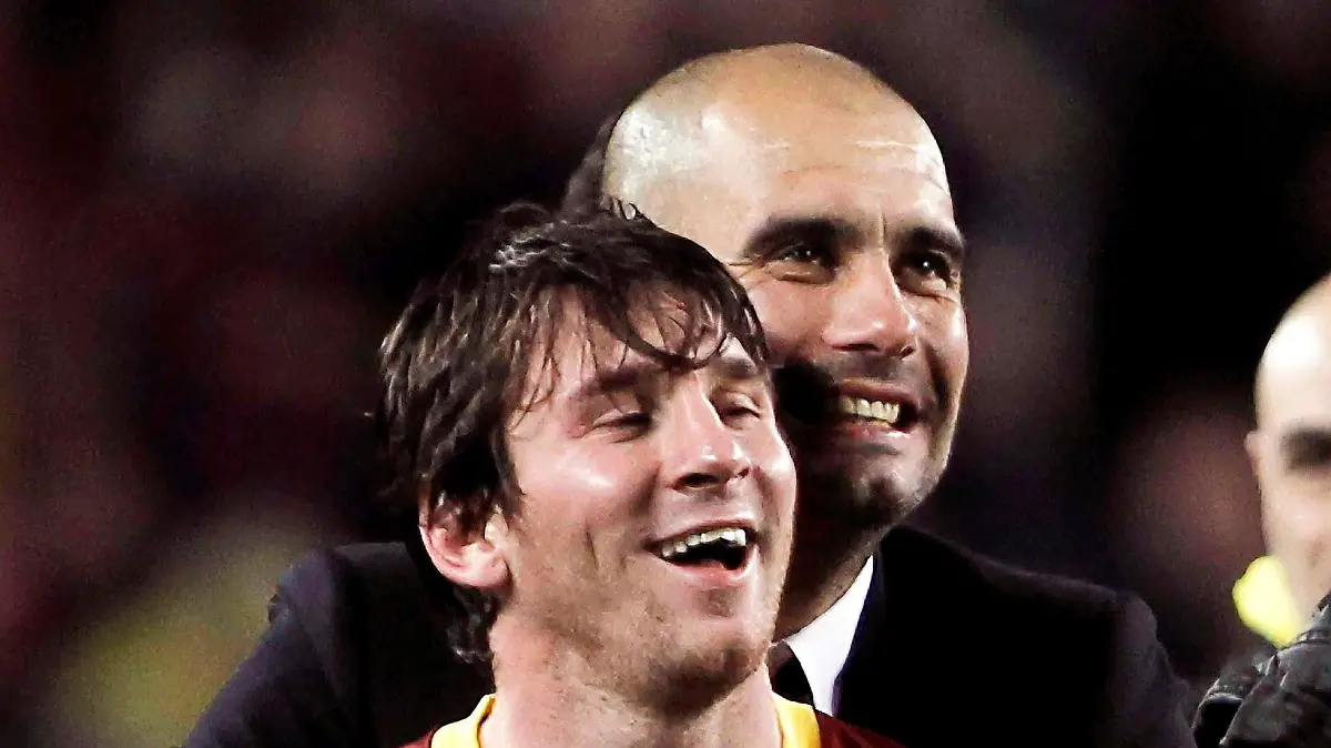 epa03197959 (FILE) A file picture dated 03 May 2011 shows FC Barcelona's head coach Josep Guardiola embracing Argentinian striker Lionel Messi (front) after the UEFA Champions League semi final second leg soccer match between FC Barcelona and Real Madrid at Camp Nou stadium in Barcelona, north-eastern Spain. Guardiola on 27 April 2012 confirmed his decision to step down as coach of Barcelona. Guardiola, 41, took over at Barca in 2008 and guided Lionel Messi and company to the most successful spell in the club's history, winning 13 out of a possible 17 trophies. EPA/ALBERTO ESTEVEZ