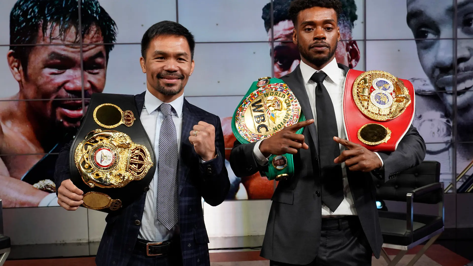 Manny Pacquiao, left, and Errol Spence Jr., pose for a photo at a news conference at the Fox Studios lot in Los Angeles ahead of their upcoming boxing match, taking place in Las Vegas on Aug. 21, in Los Angeles Sunday, July 11, 2021. (AP Photo/Damian Dovarganes)