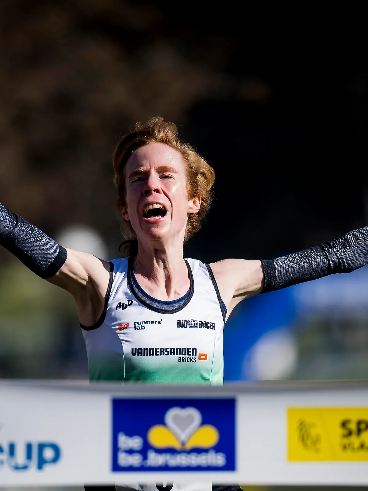 Mieke Gorissen celebrates after winning the women's race at the first stage (out of three) of the 'CrossCup' cross country running trophy, Sunday 28 February 2021, in Brussels