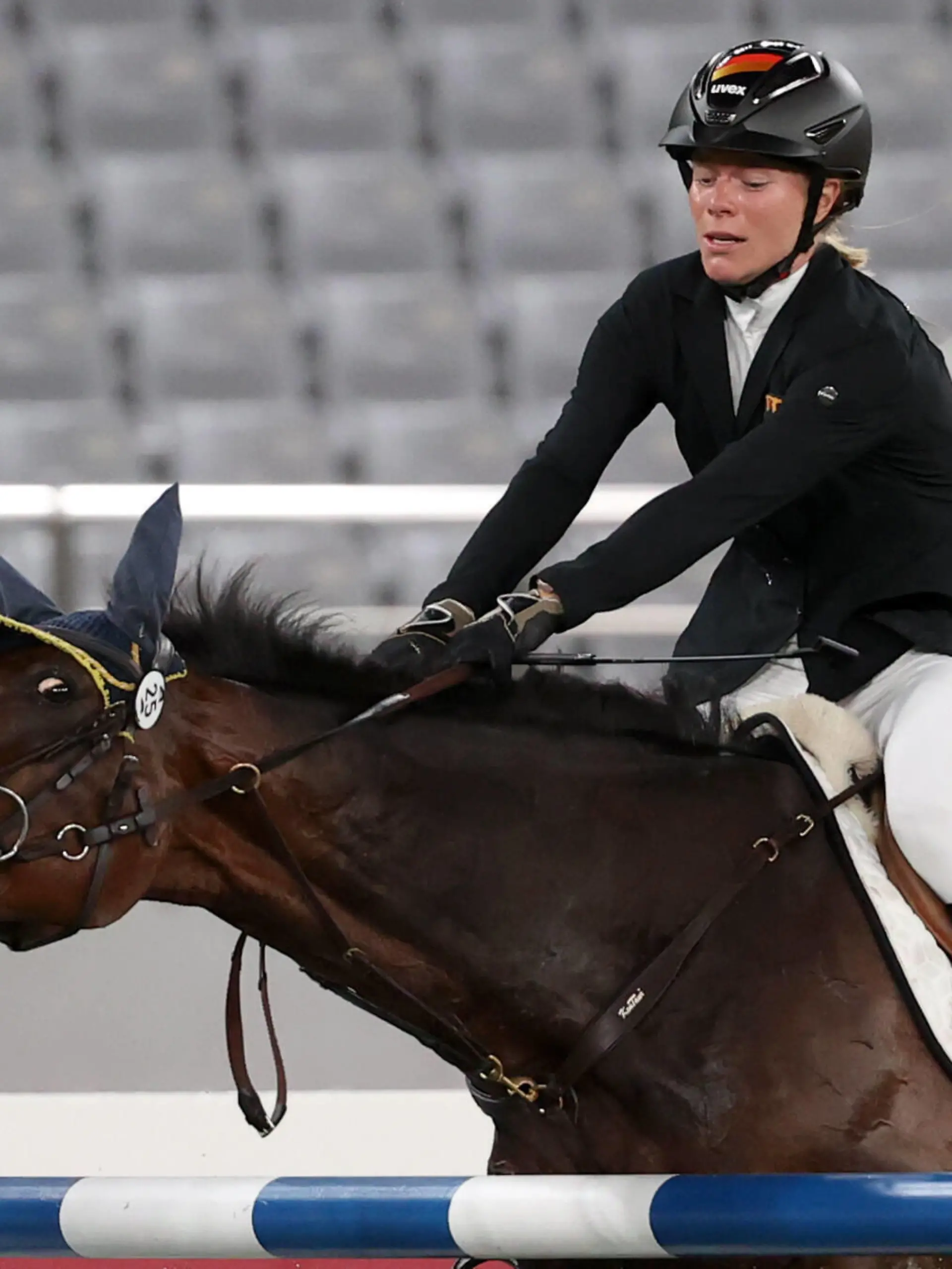  TOKYO, JAPAN - AUGUST 6, 2021: Germany s Annika Schleu competes in the women s individual riding show jumping event during the Modern pentathlon, moderner Fünfkampf competition at the 2020 Summer Olympic Games, Olympische Spiele, Olympia, OS at Tokyo Stadium. Stanislav Krasilnikov/TASS PUBLICATIONxINxGERxAUTxONLY TS10BA80