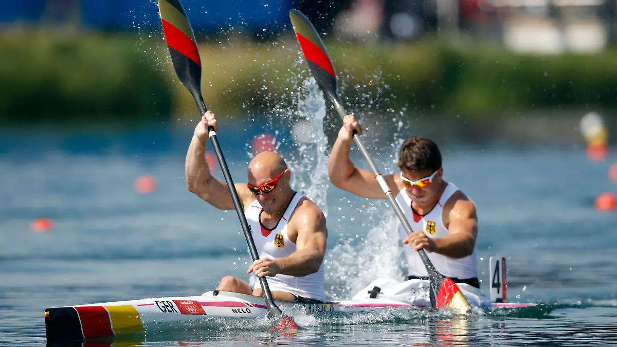 Germany's Ronald Rauhe and Jonas Ems compete in the men's kayak double (K2) 200m semifinal at the Eton Dorney during the London 2012 Olympic Games August 10, 2012. REUTERS/Darren Whiteside (BRITAIN - Tags: OLYMPICS SPORT CANOEING)