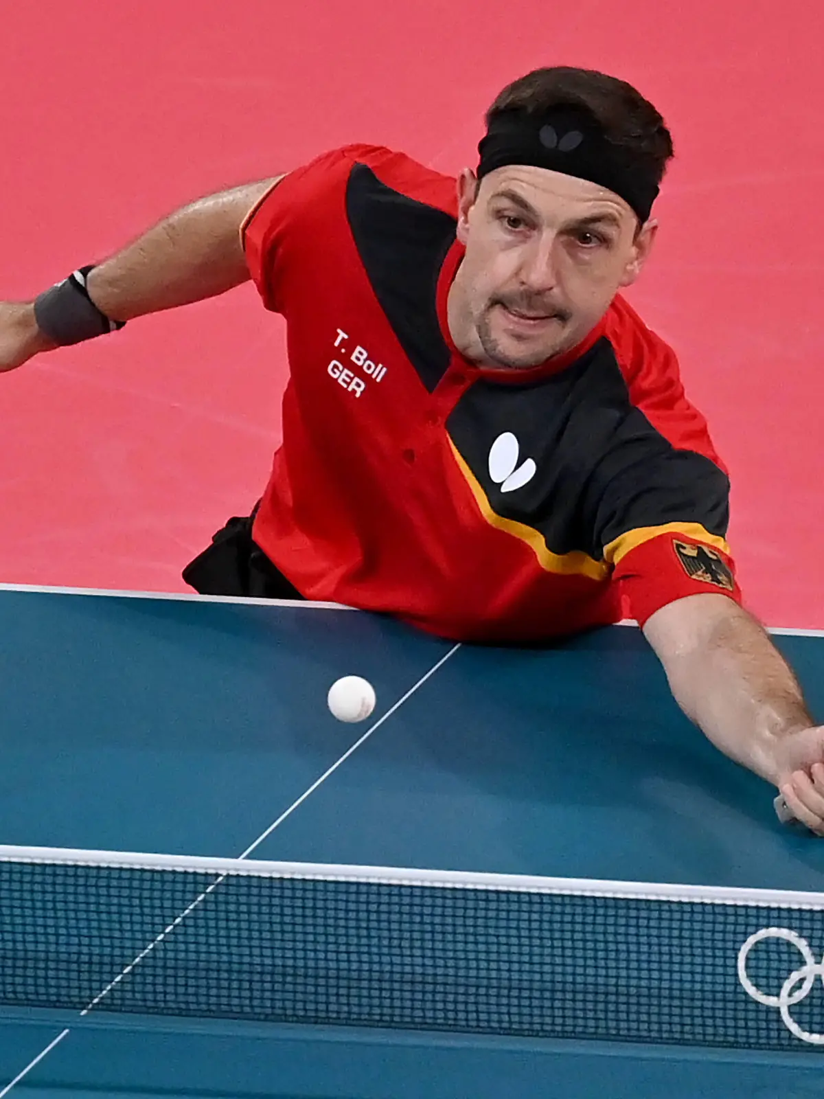  210727 -- TOKYO, July 27, 2021 -- Timo Boll of Germany reacts during the men s singles round of 16 match of Table tennis, Tischtennis between Timo Boll of Germany and Jeoung Youngsik of South Korea at Tokyo 2020 Olympic Games, Olympische Spiele, Olympia, OS in Tokyo, Japan, July 27, 2021.  TOKYO2020JAPAN-TOKYO-OLY-TABLE TENNIS-MEN S SINGLES GuoxChen PUBLICATIONxNOTxINxCHN